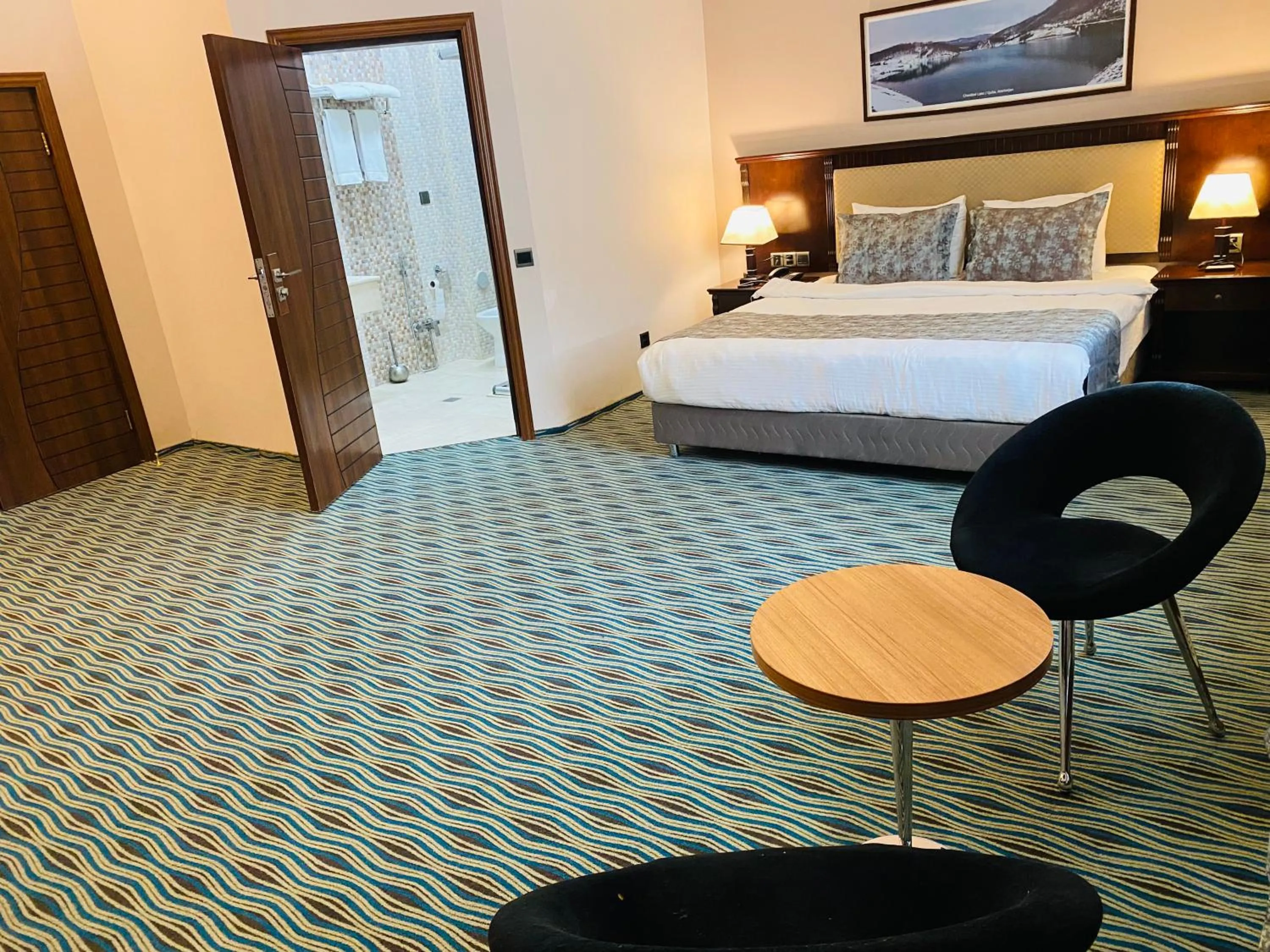 Bed in Ruma Port Hotel