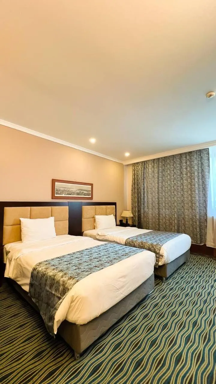 Bed in Ruma Port Hotel