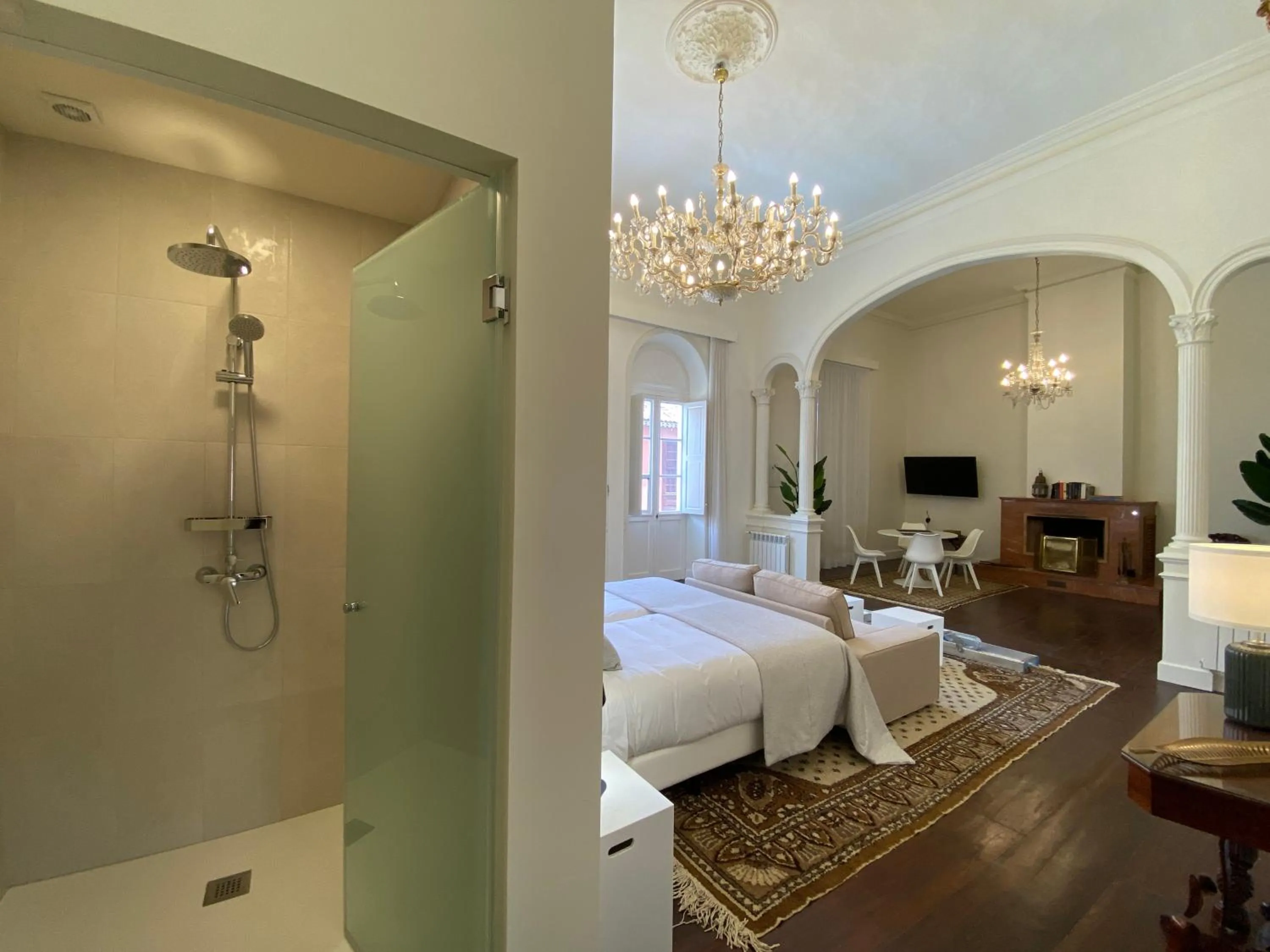 Shower, Bed in Nava Suites