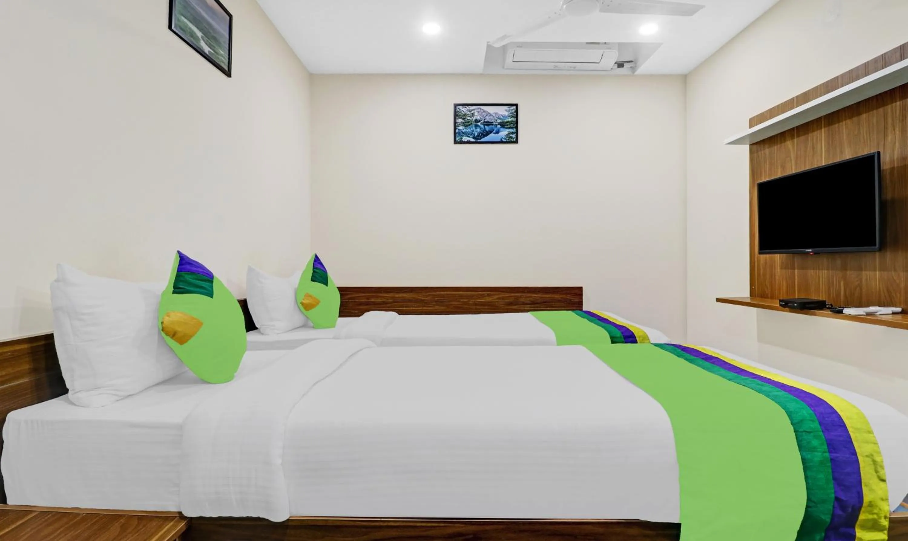 Bedroom, Bed in Treebo Purple Orchid Boutique