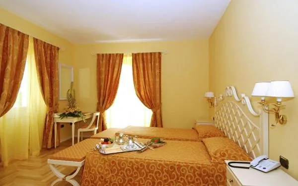 Bed in Villa Sofia Hotel