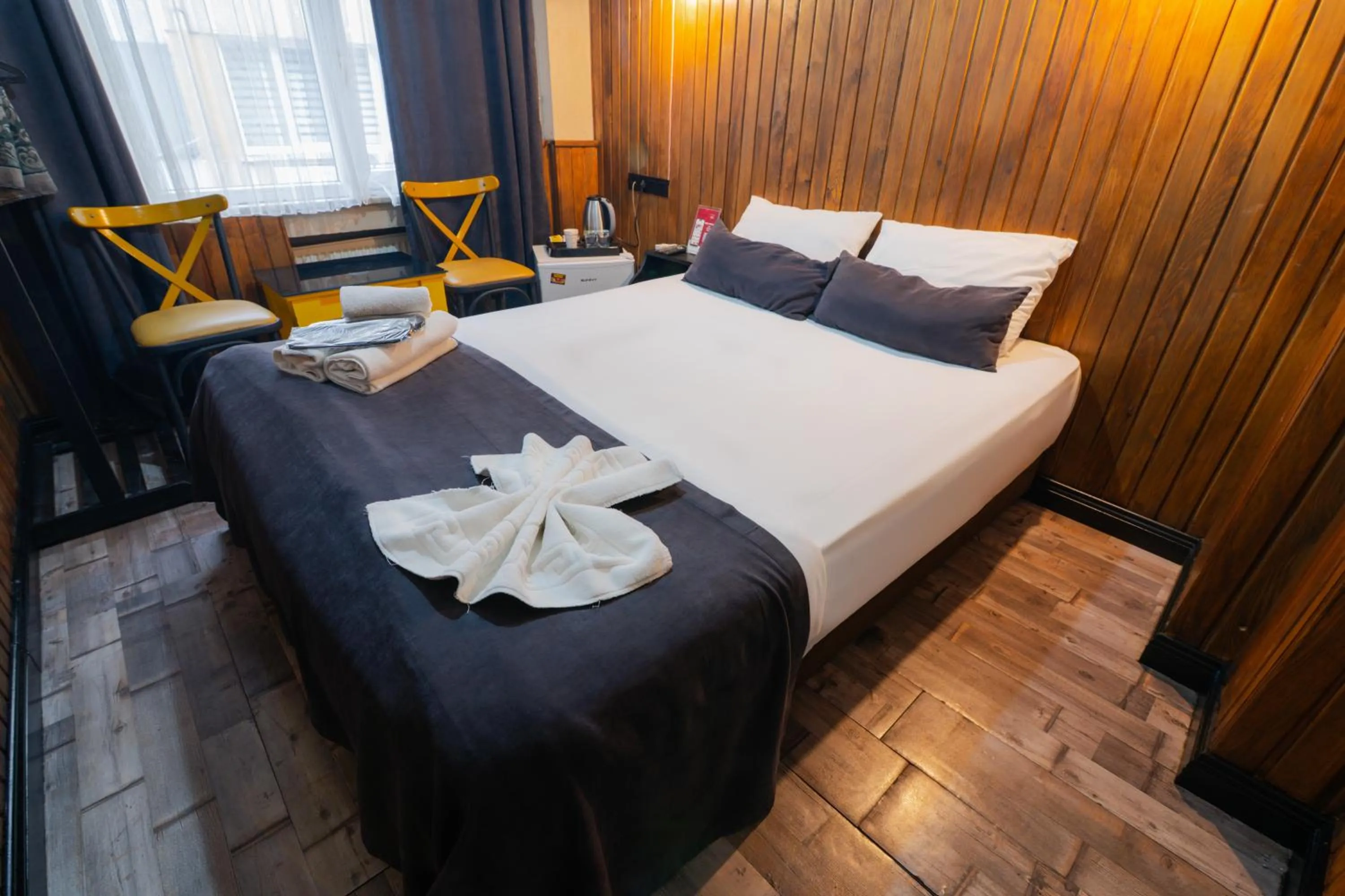 Bed in İmza Hotel Suite