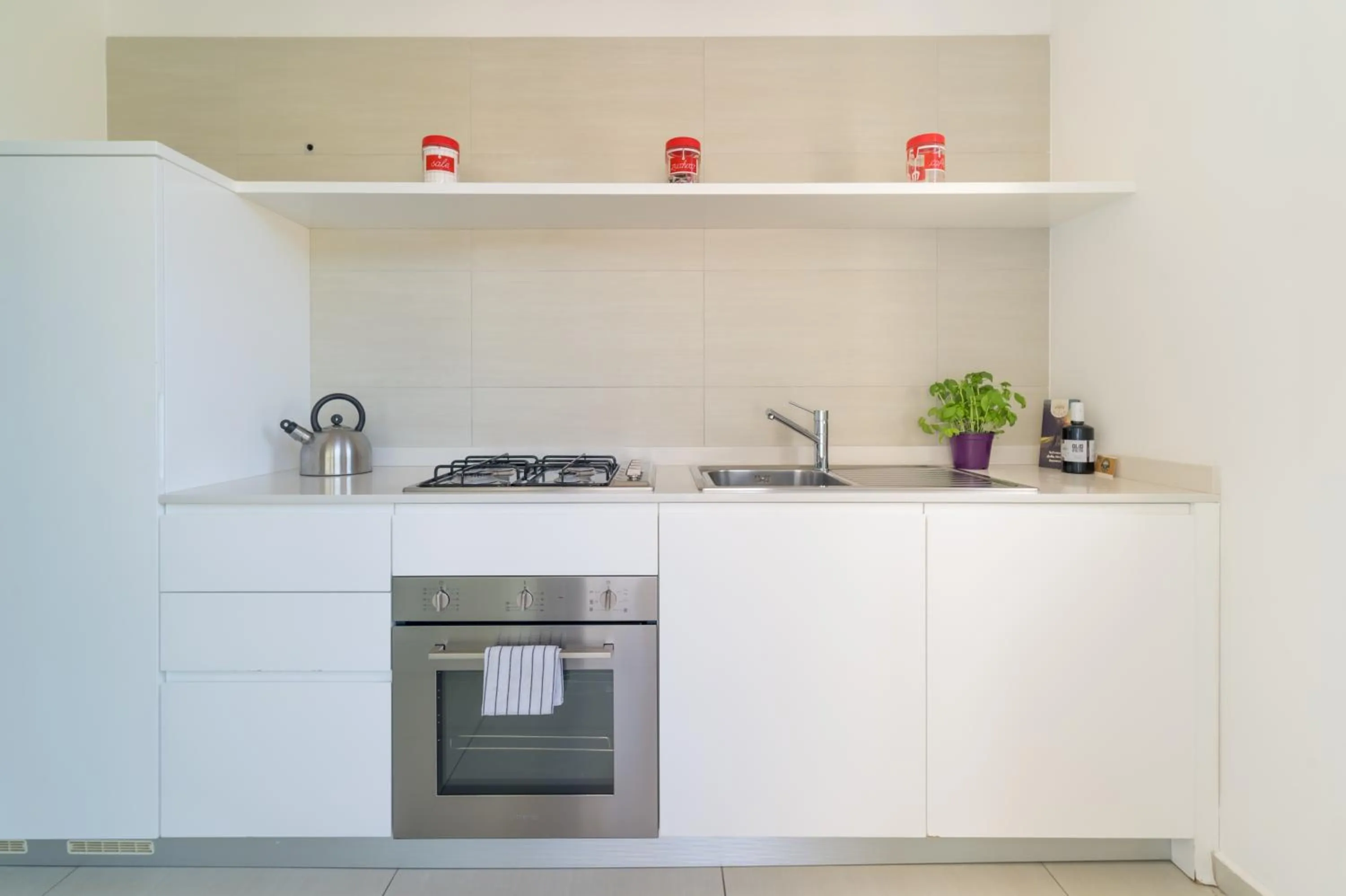 Kitchen or kitchenette in Appartamenti Sud Est