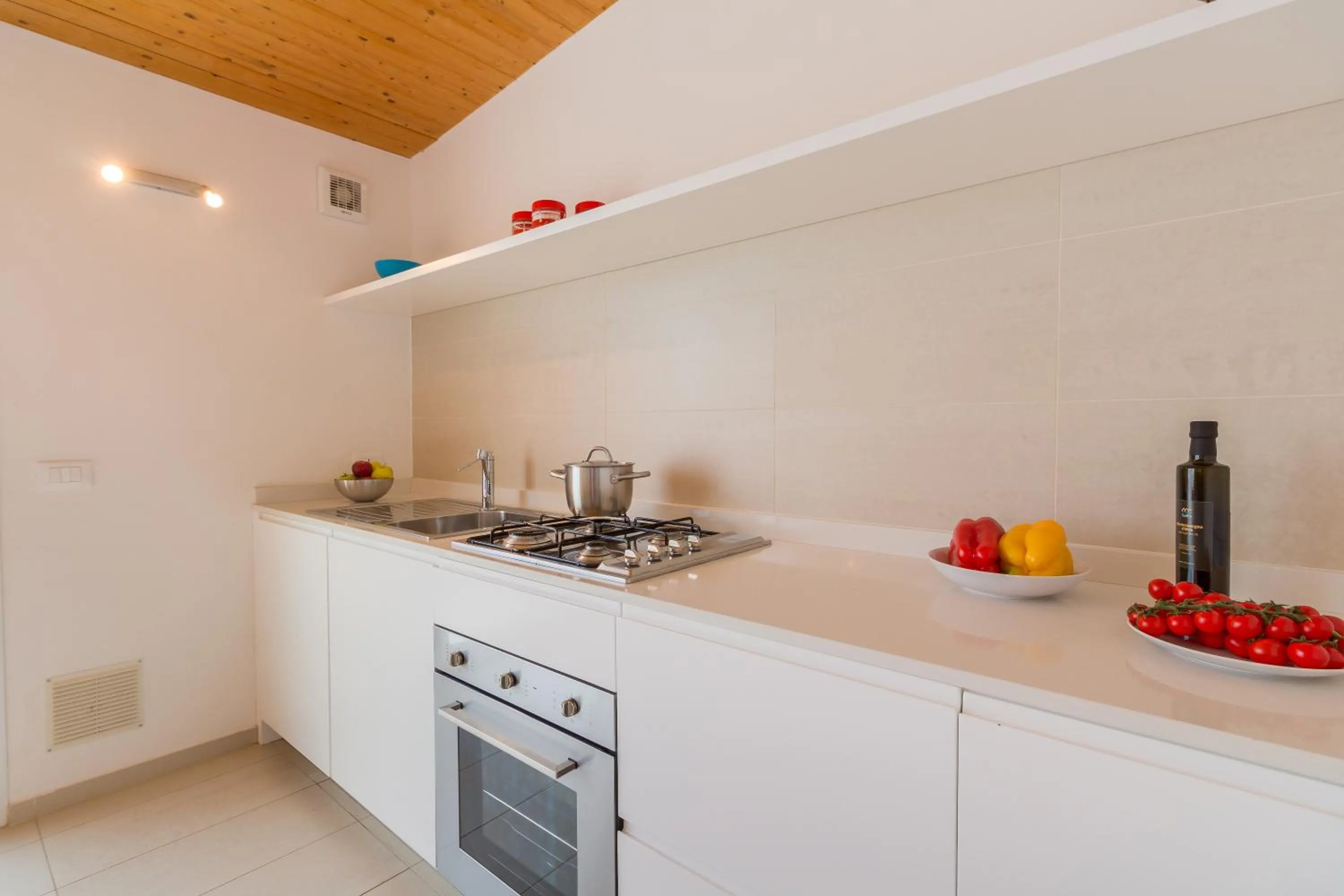 Kitchen or kitchenette in Appartamenti Sud Est