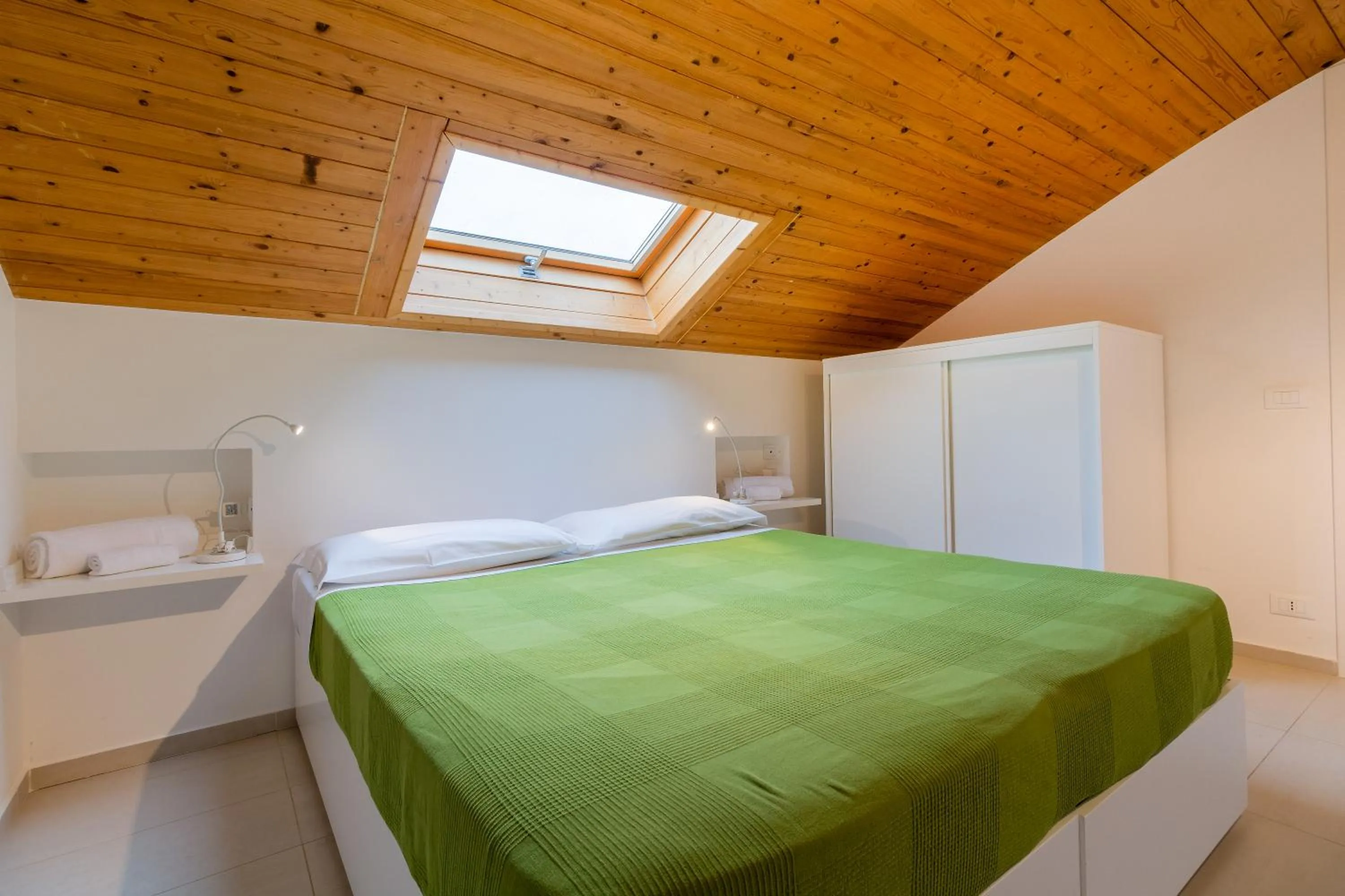 Bed in Appartamenti Sud Est