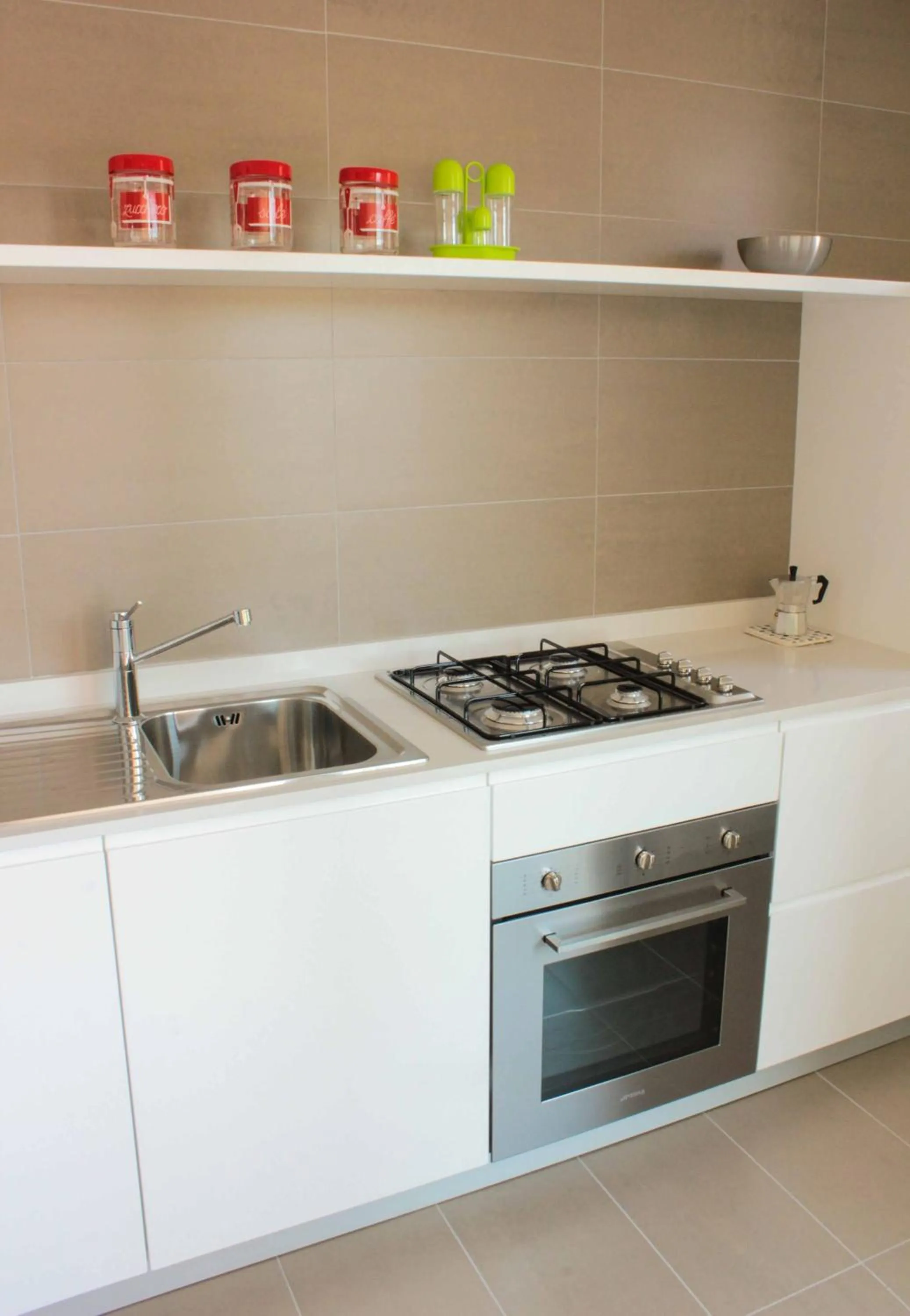 Kitchen or kitchenette in Appartamenti Sud Est