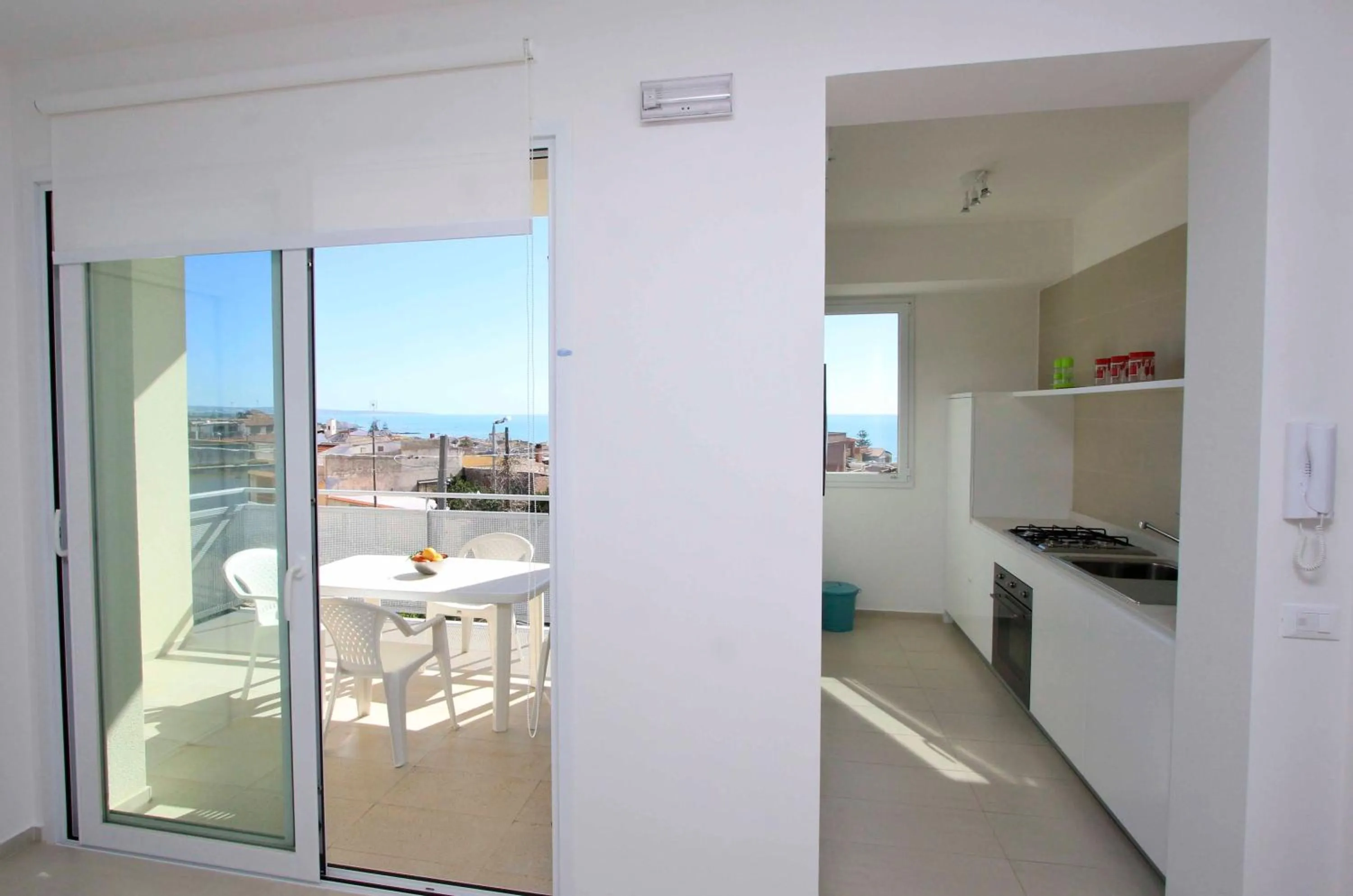 Kitchen or kitchenette in Appartamenti Sud Est