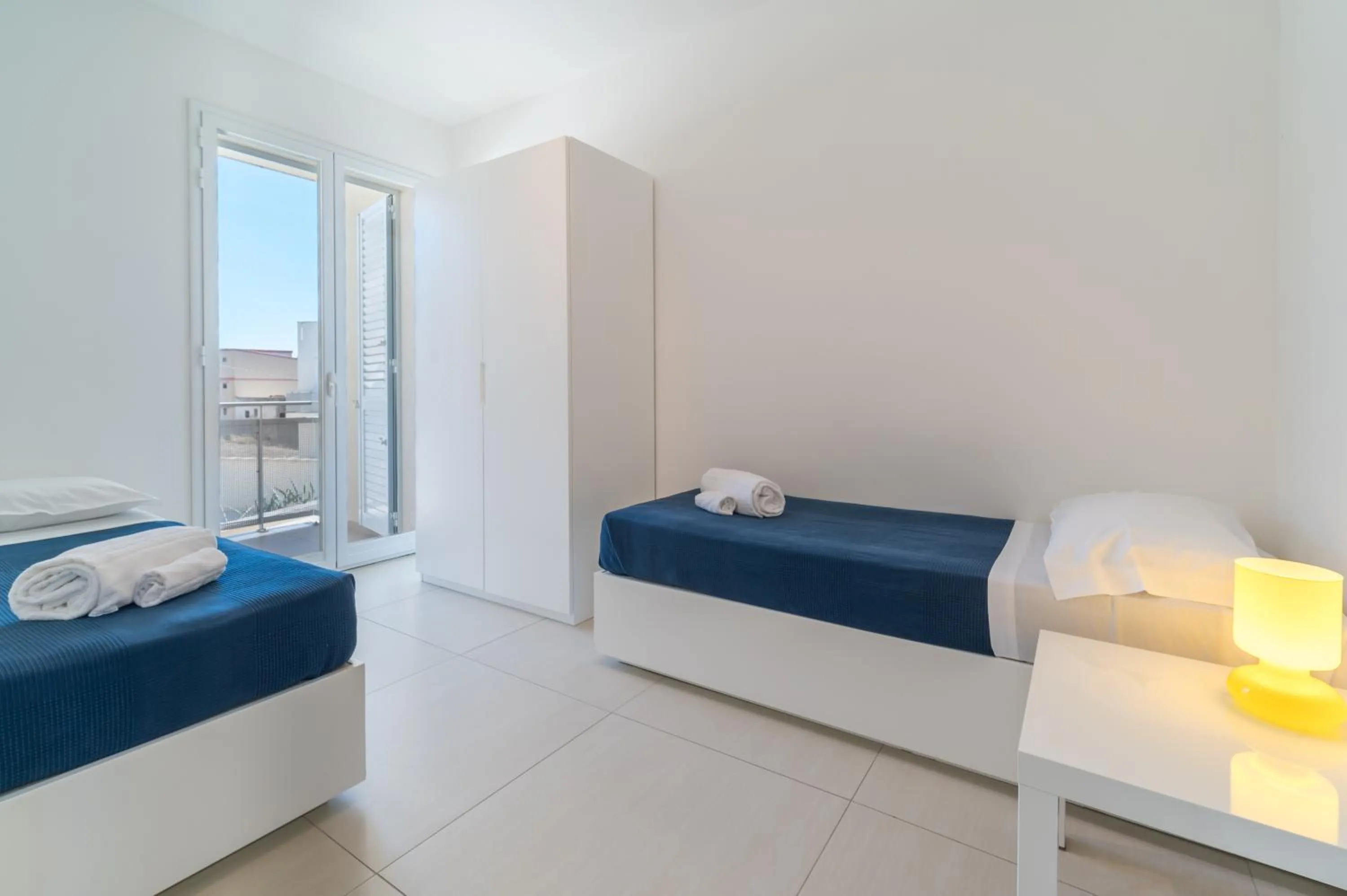 Bedroom, Bed in Appartamenti Sud Est