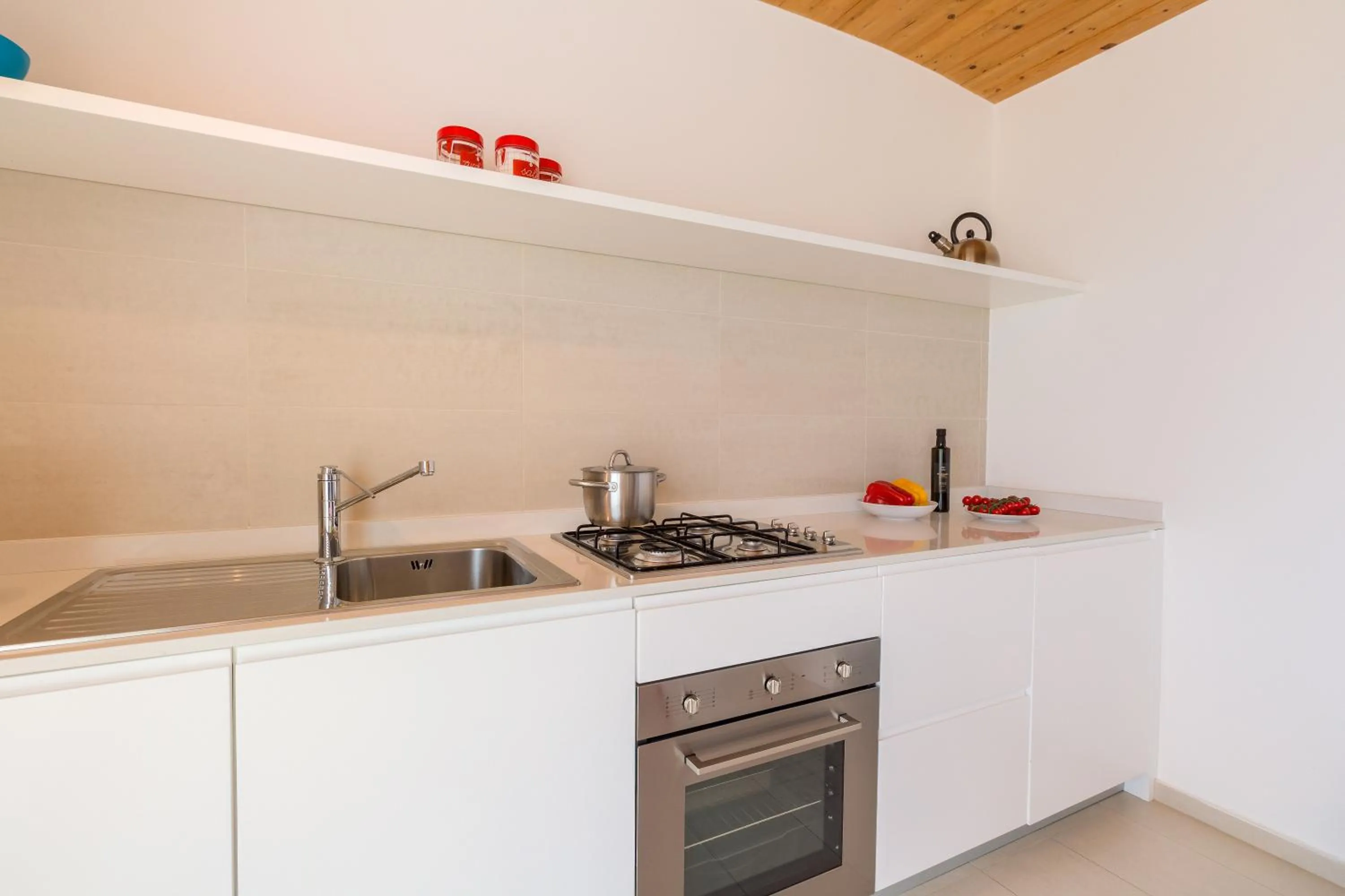 Kitchen or kitchenette in Appartamenti Sud Est