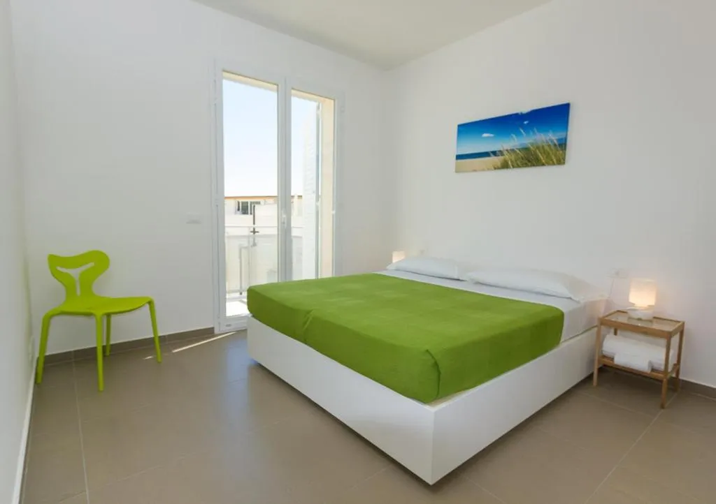 Bedroom, Bed in Appartamenti Sud Est