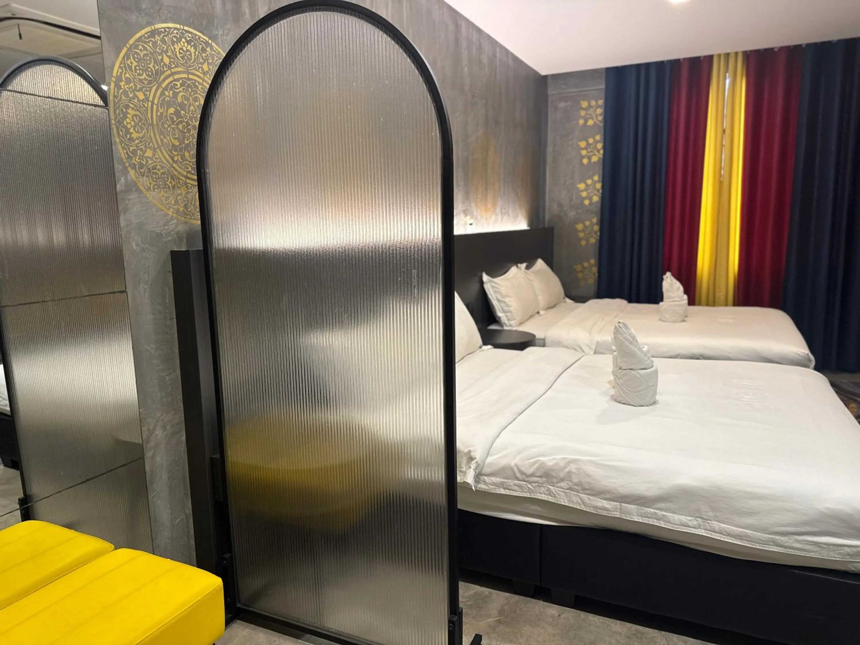 Bed in Sri Indar Hotel & Suites