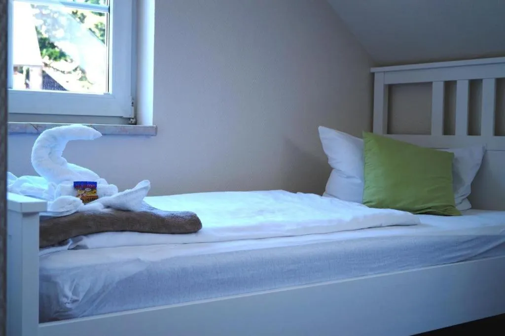 Bed in REGIOHOTEL Aparthotel Wernigerode - #Ferienwohnungen #Familienfreundlich #Harzurlaub #Freeparking