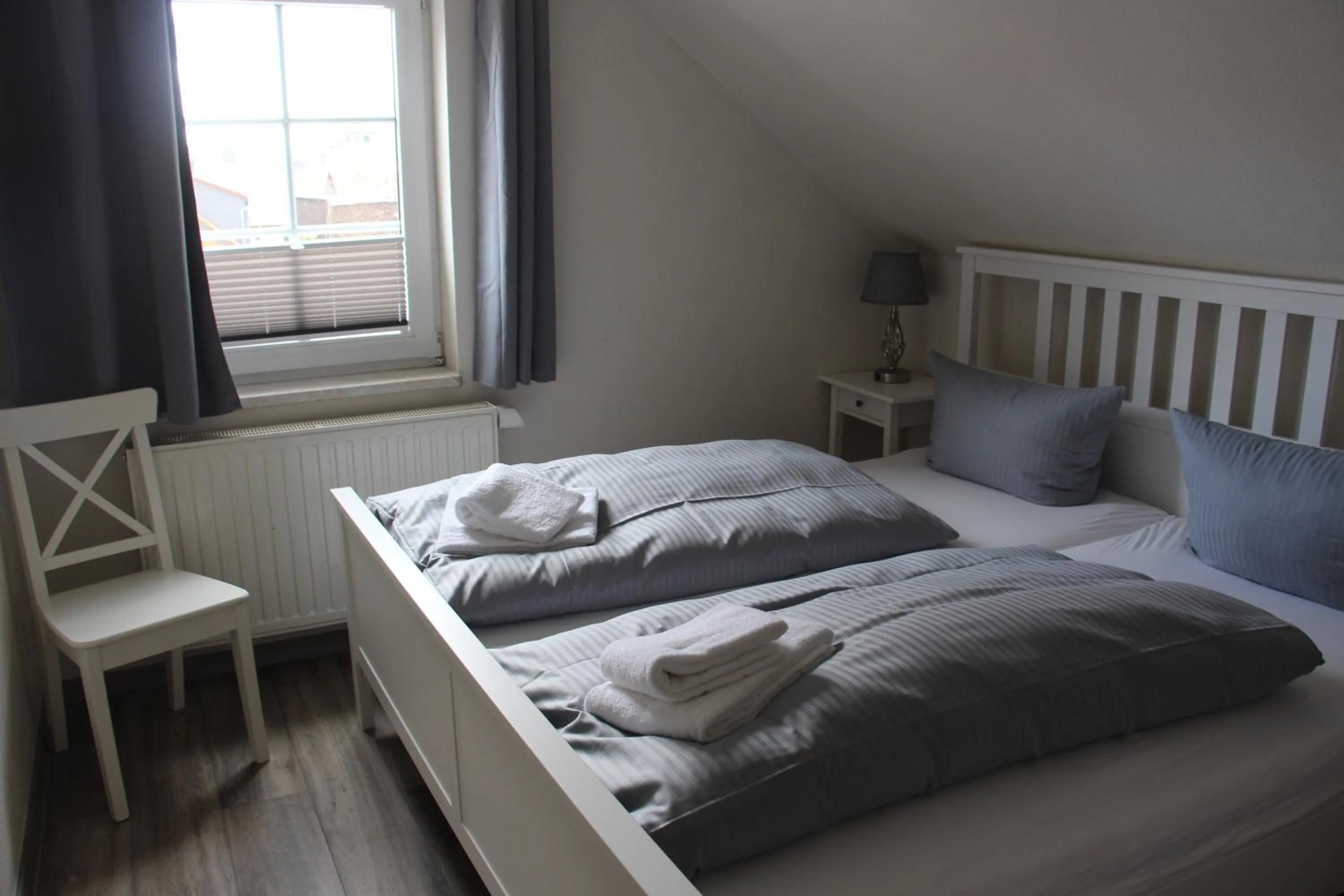 Bed in REGIOHOTEL Aparthotel Wernigerode - #Ferienwohnungen #Familienfreundlich #Harzurlaub #Freeparking