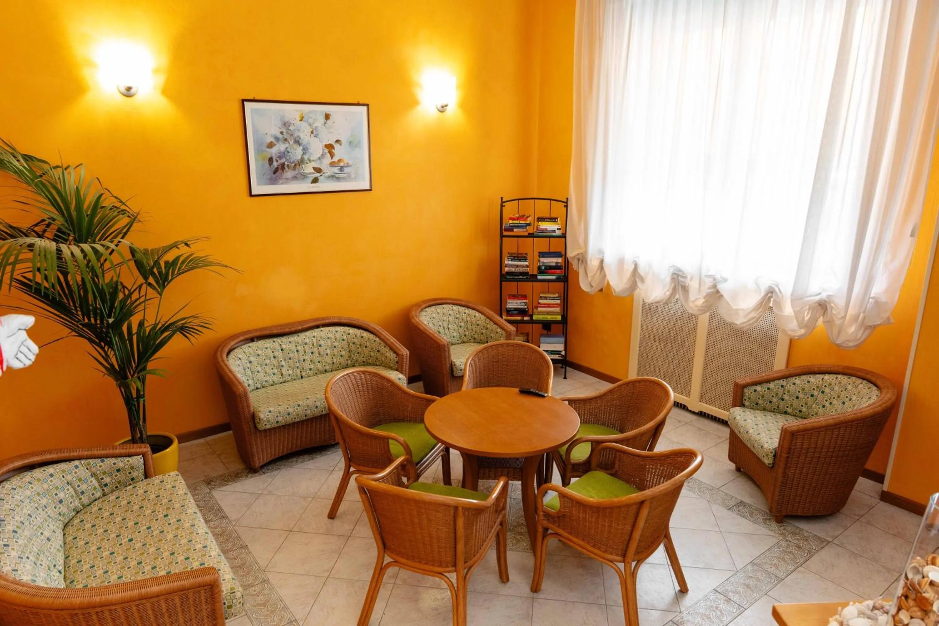 Communal lounge/ TV room in Hotel Pardini