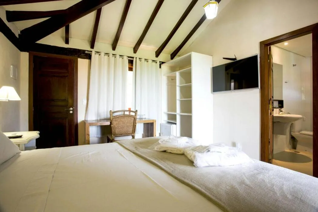 Bed in Pousada Blue Ocean