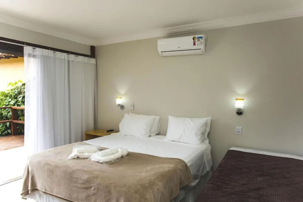 Bed in Pousada Blue Ocean