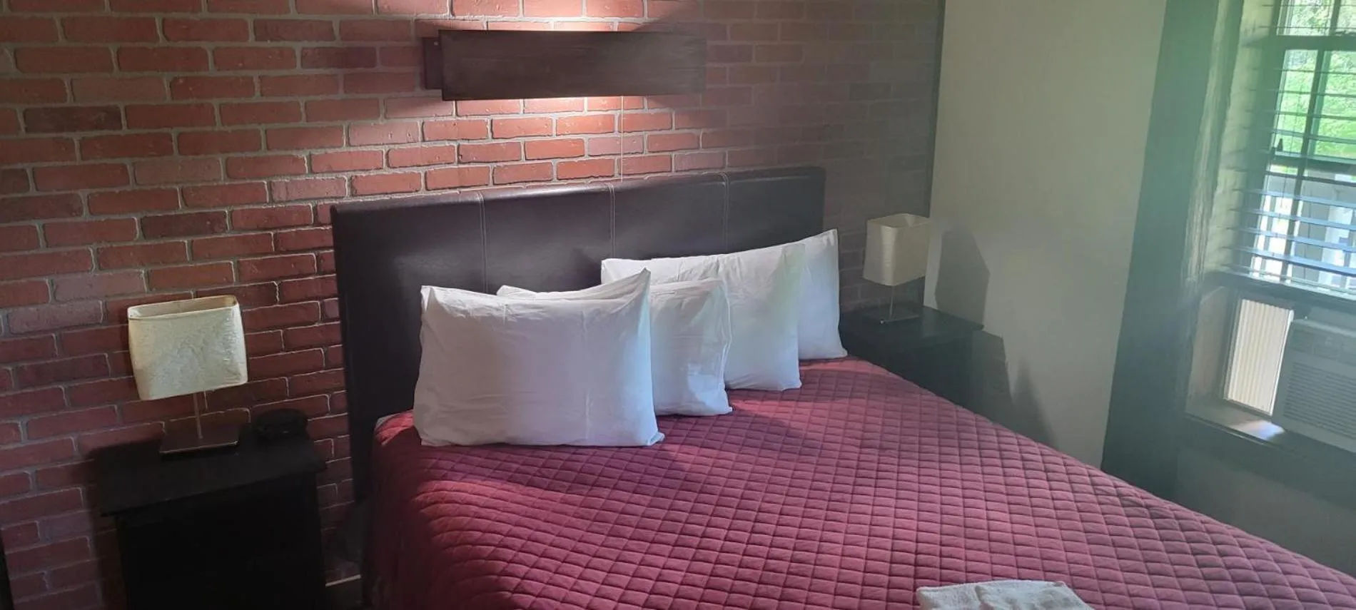 Bed in Downhill Lodge Condominium