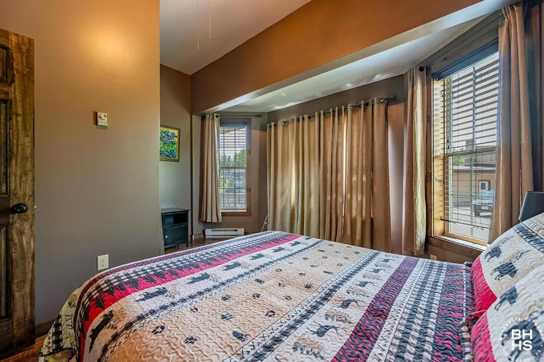 Bed in Downhill Lodge Condominium