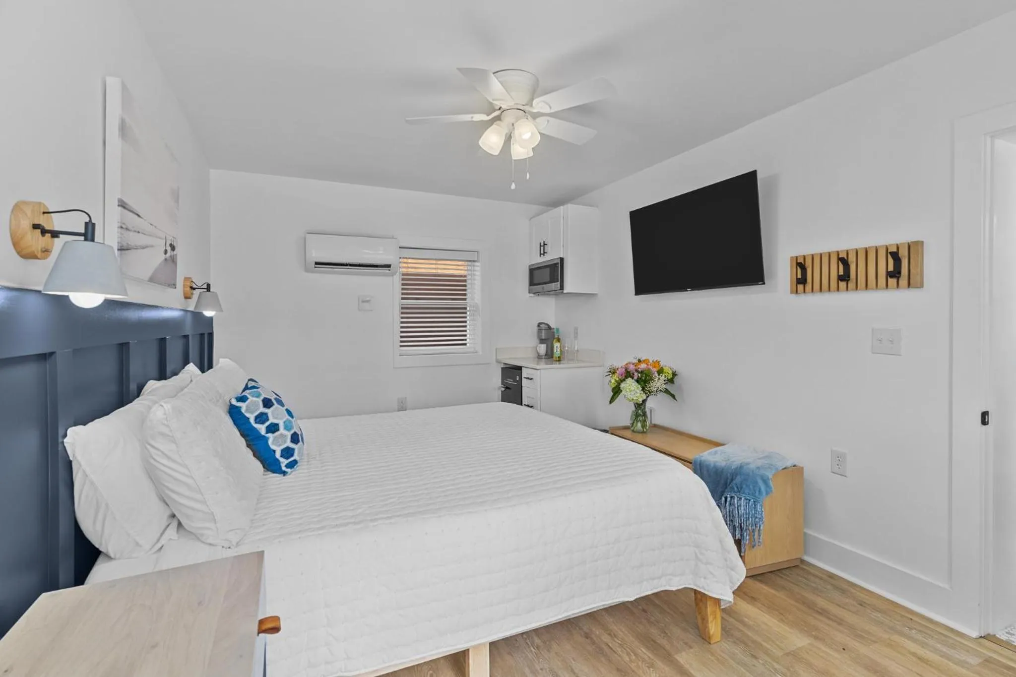 Bed in The Beach House at Oak Island by Carolina Resorts