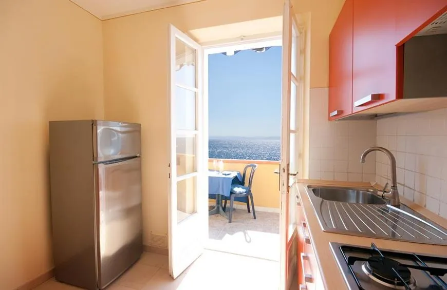 Kitchen or kitchenette in Appartamenti - Villa Mare