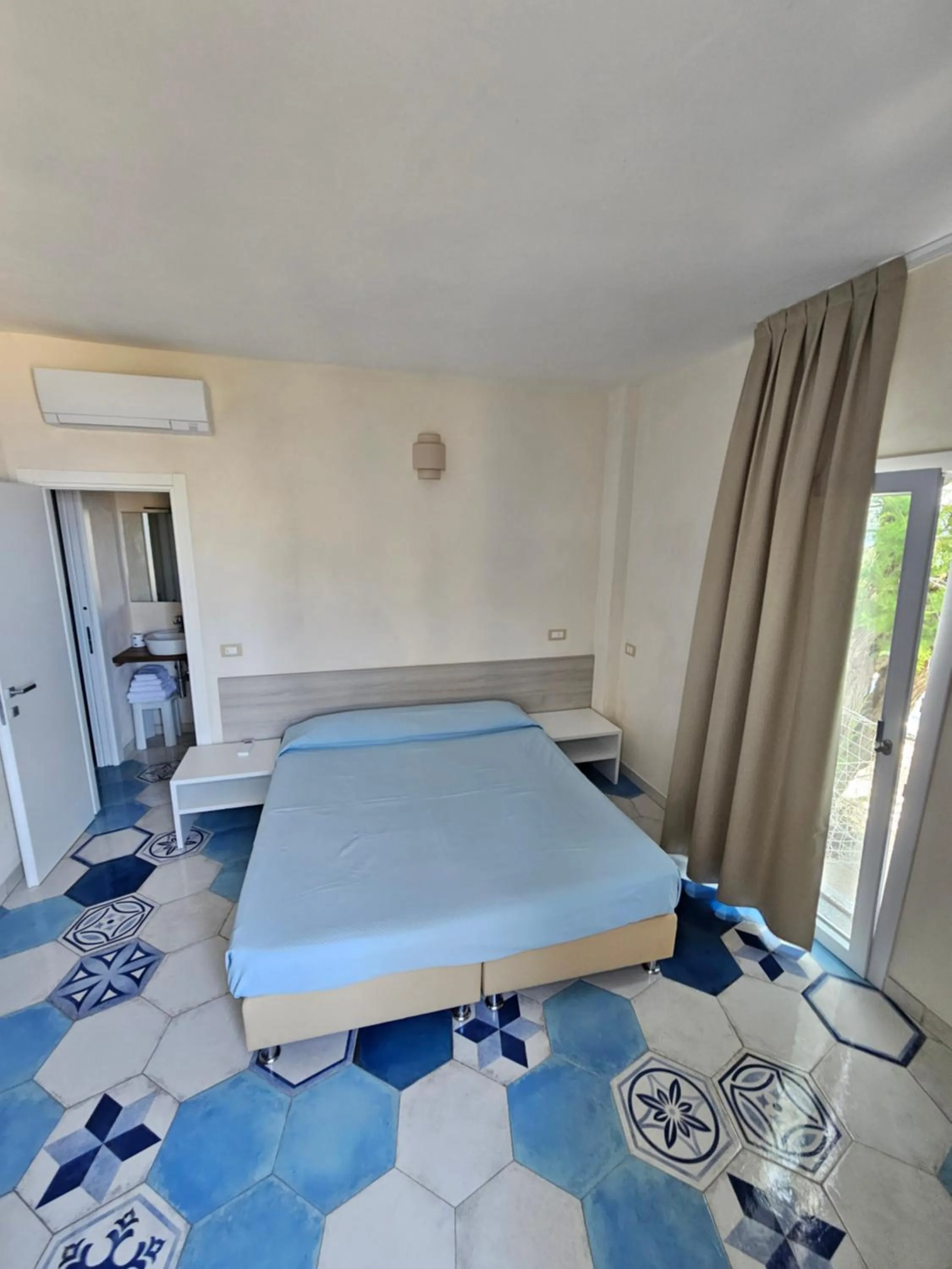 Bed in Appartamenti - Villa Mare