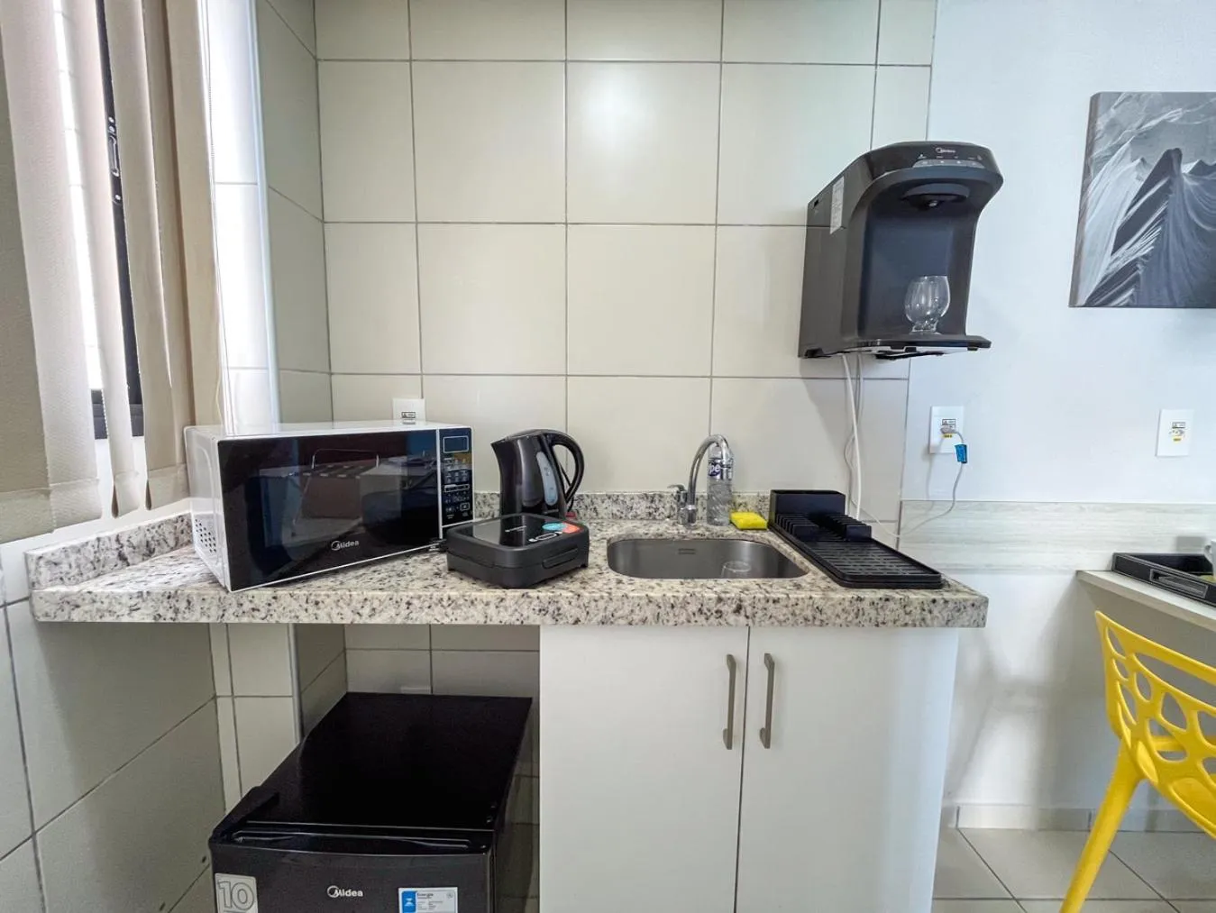 Kitchen or kitchenette in Ponta Negra Flats Confort Accommodations Vista para o Mar