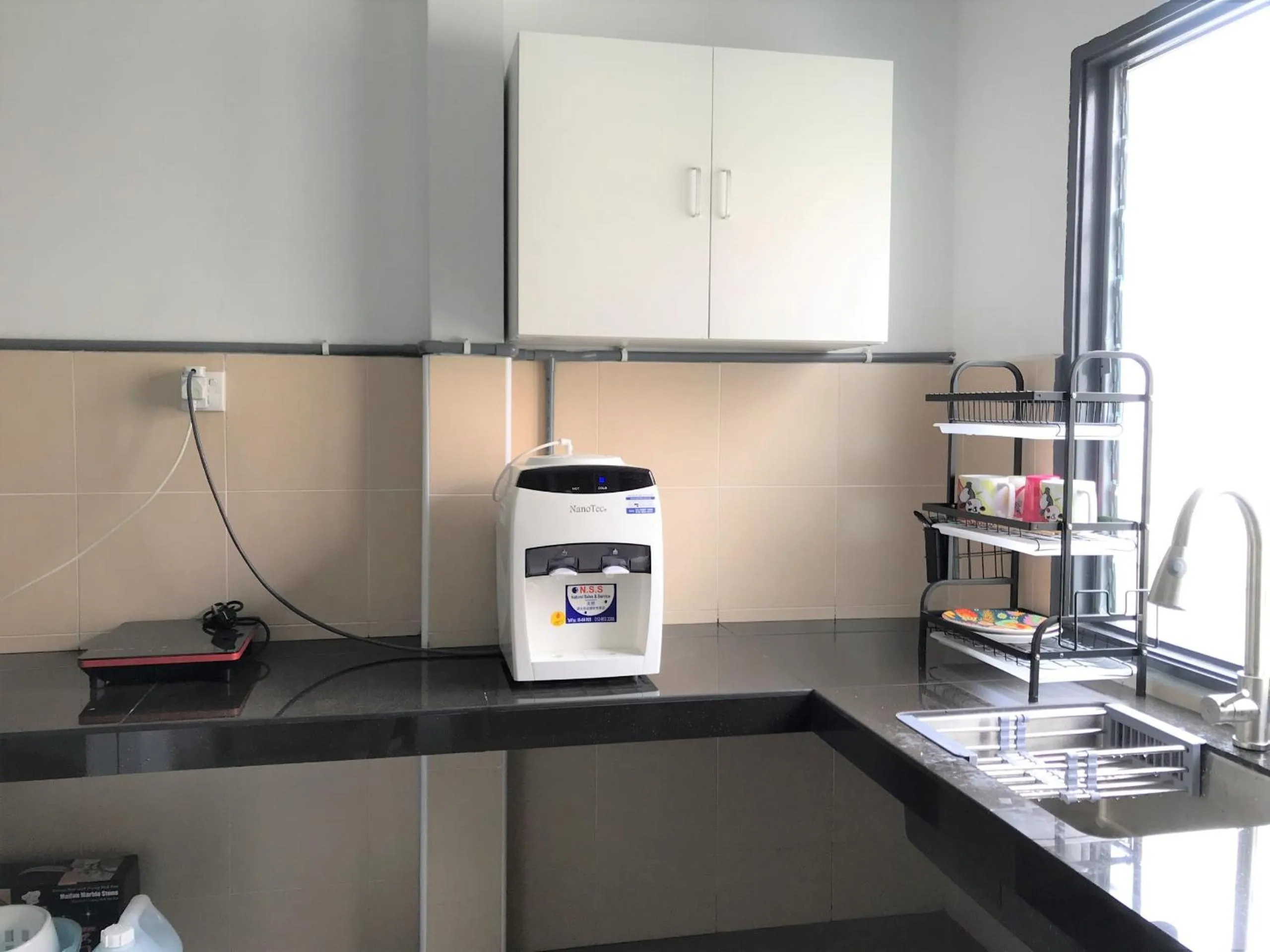 Kitchen or kitchenette in OYO 90493 JL Homestay