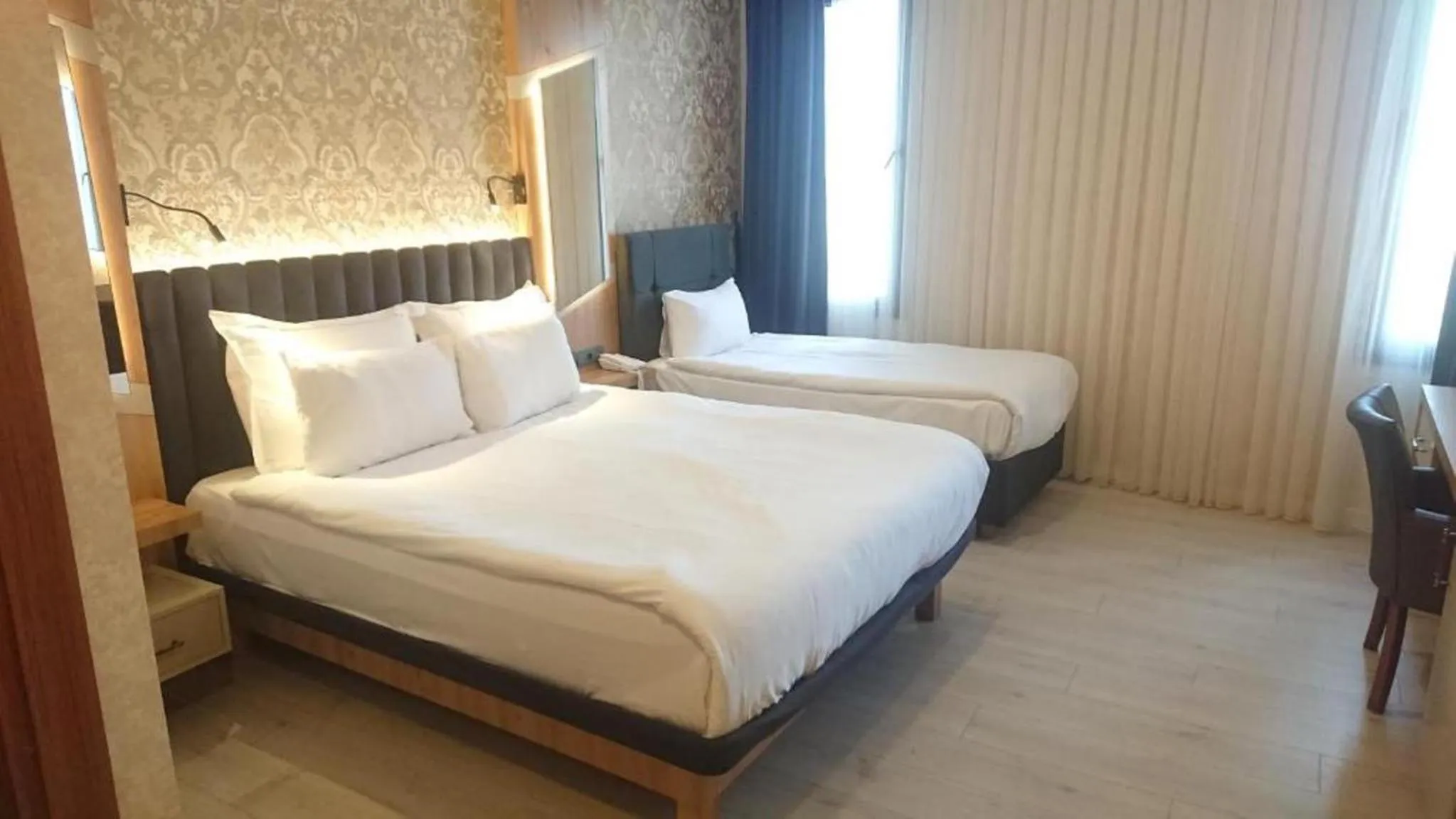 Photo of the whole room, Bed in Isnova Hotel Airport