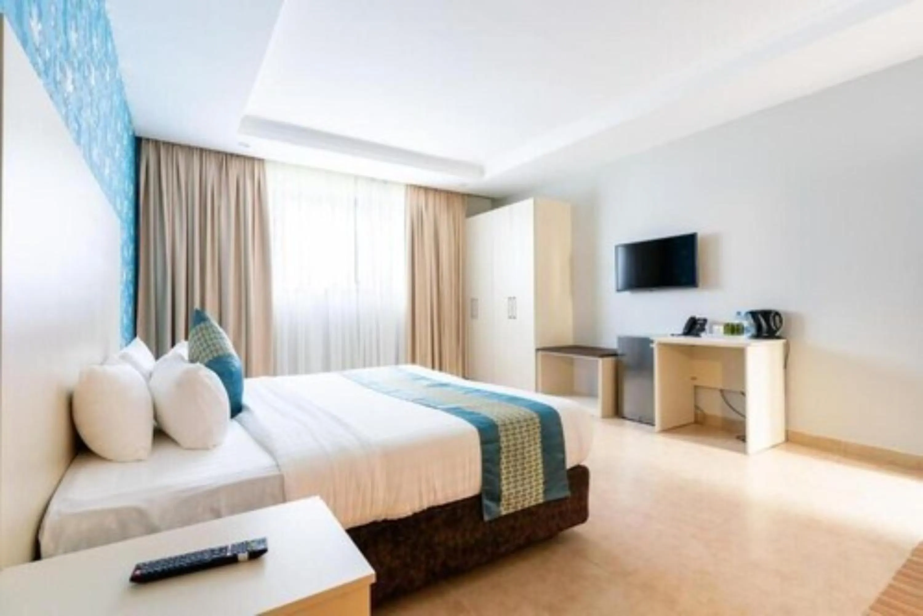 Bed in Blooming Suites