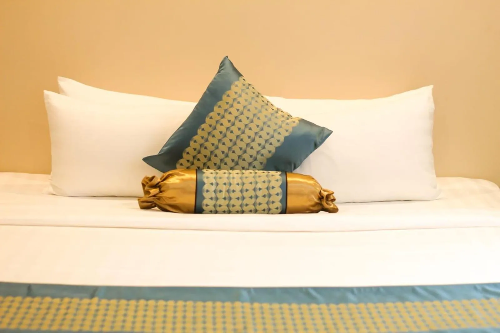 Bed in Blooming Suites