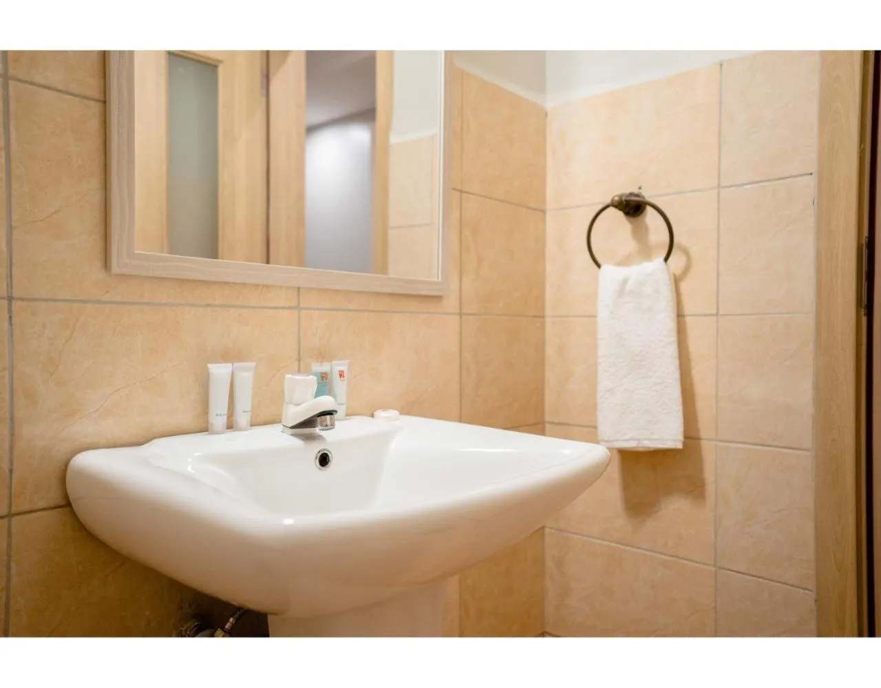 Bathroom in Blooming Suites