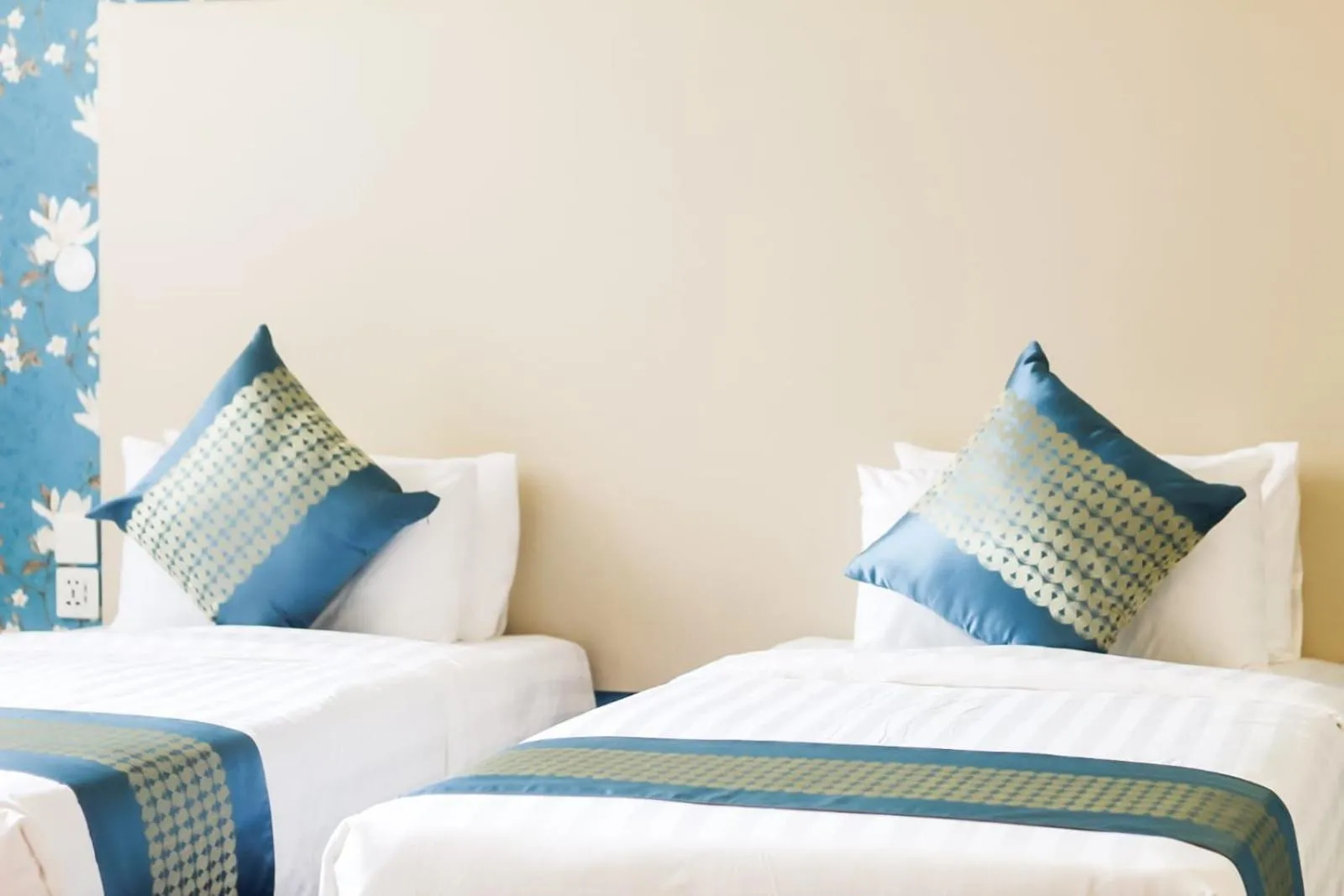 Bed in Blooming Suites