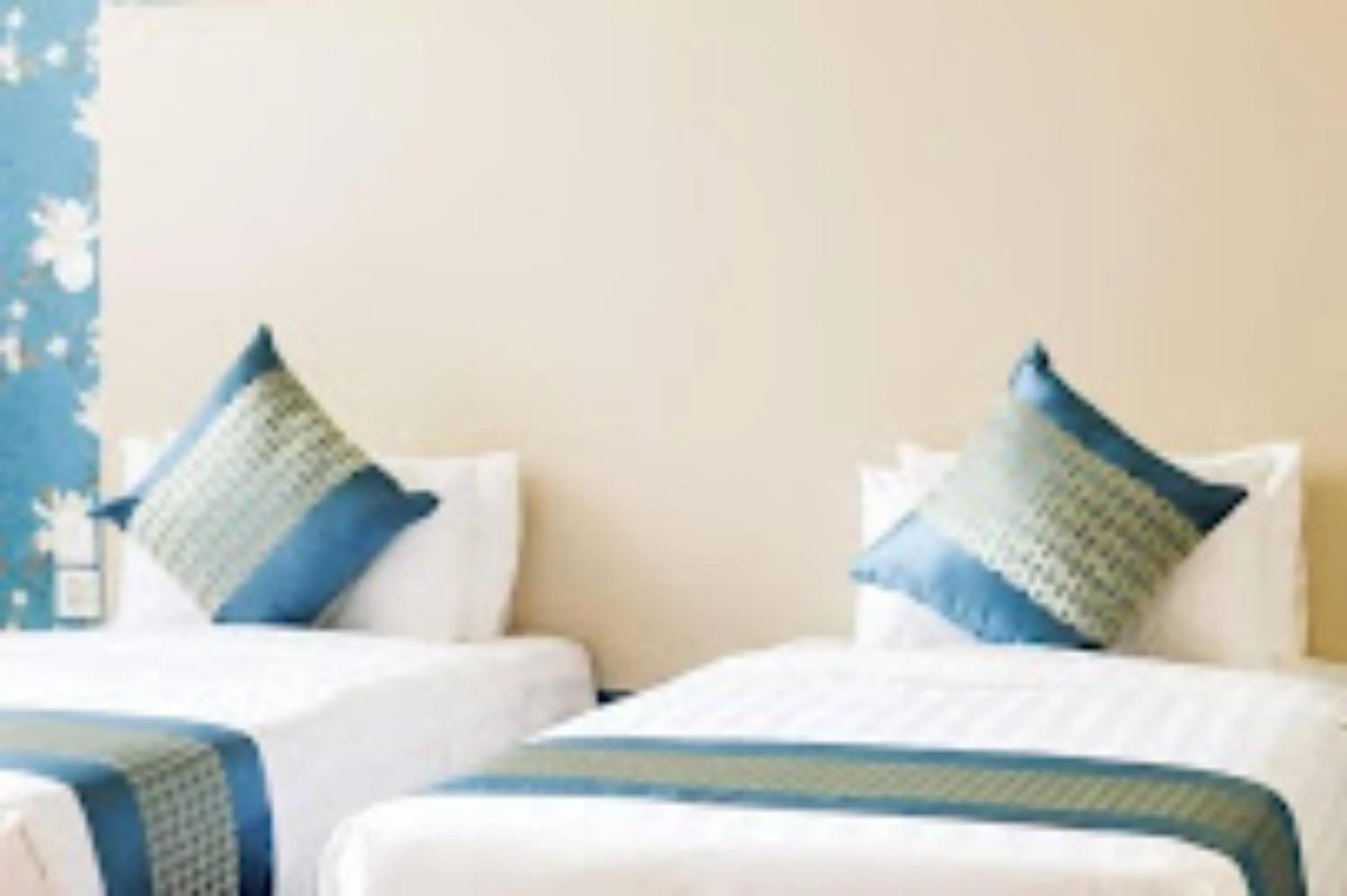 Bed in Blooming Suites