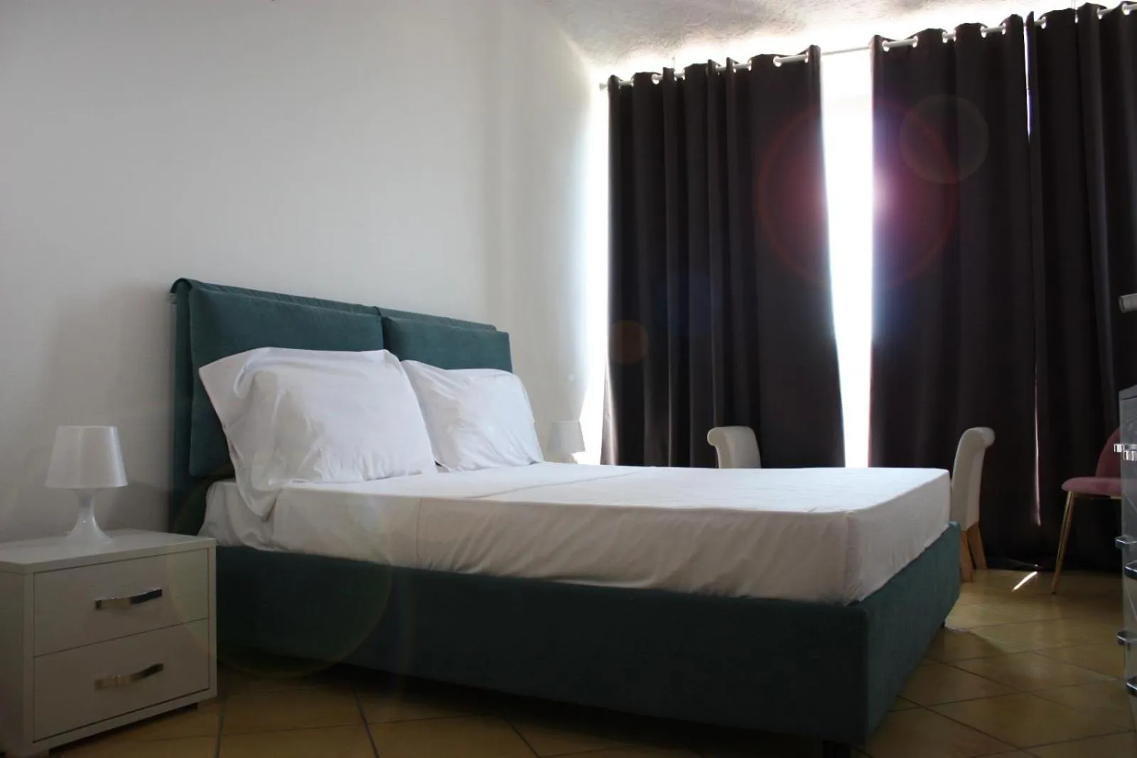 Bed in Marina Club Hotel