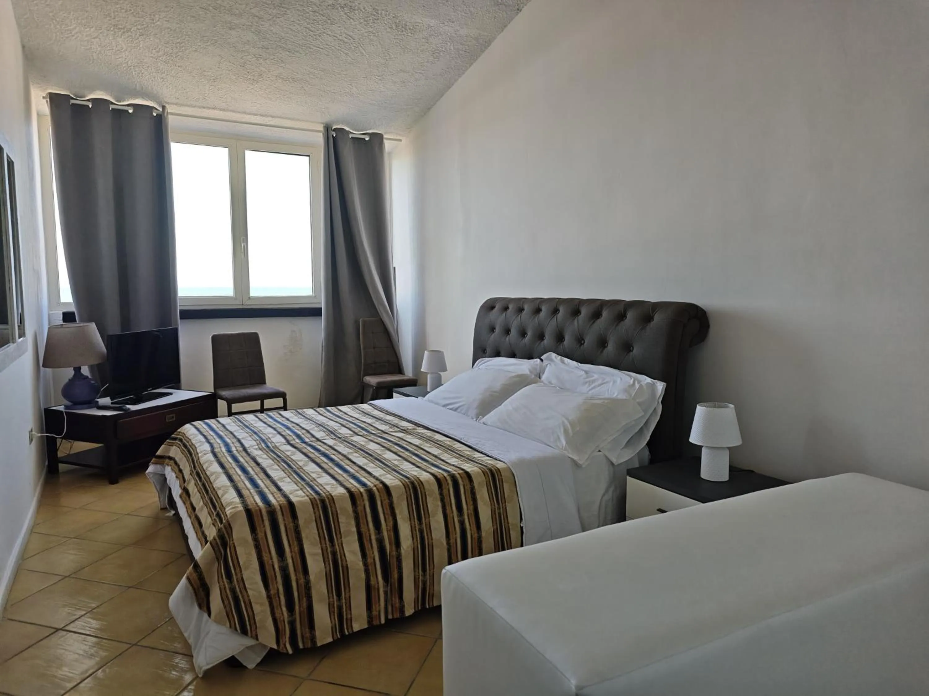 Bed in Marina Club Hotel