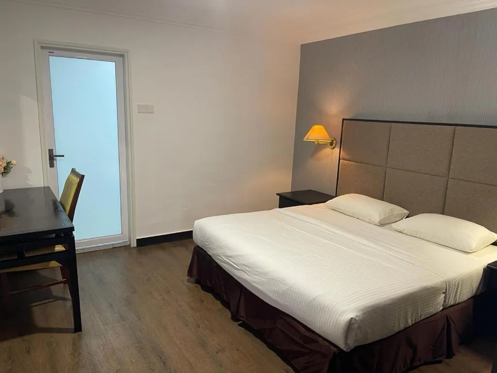 Bed in Remington Hotel