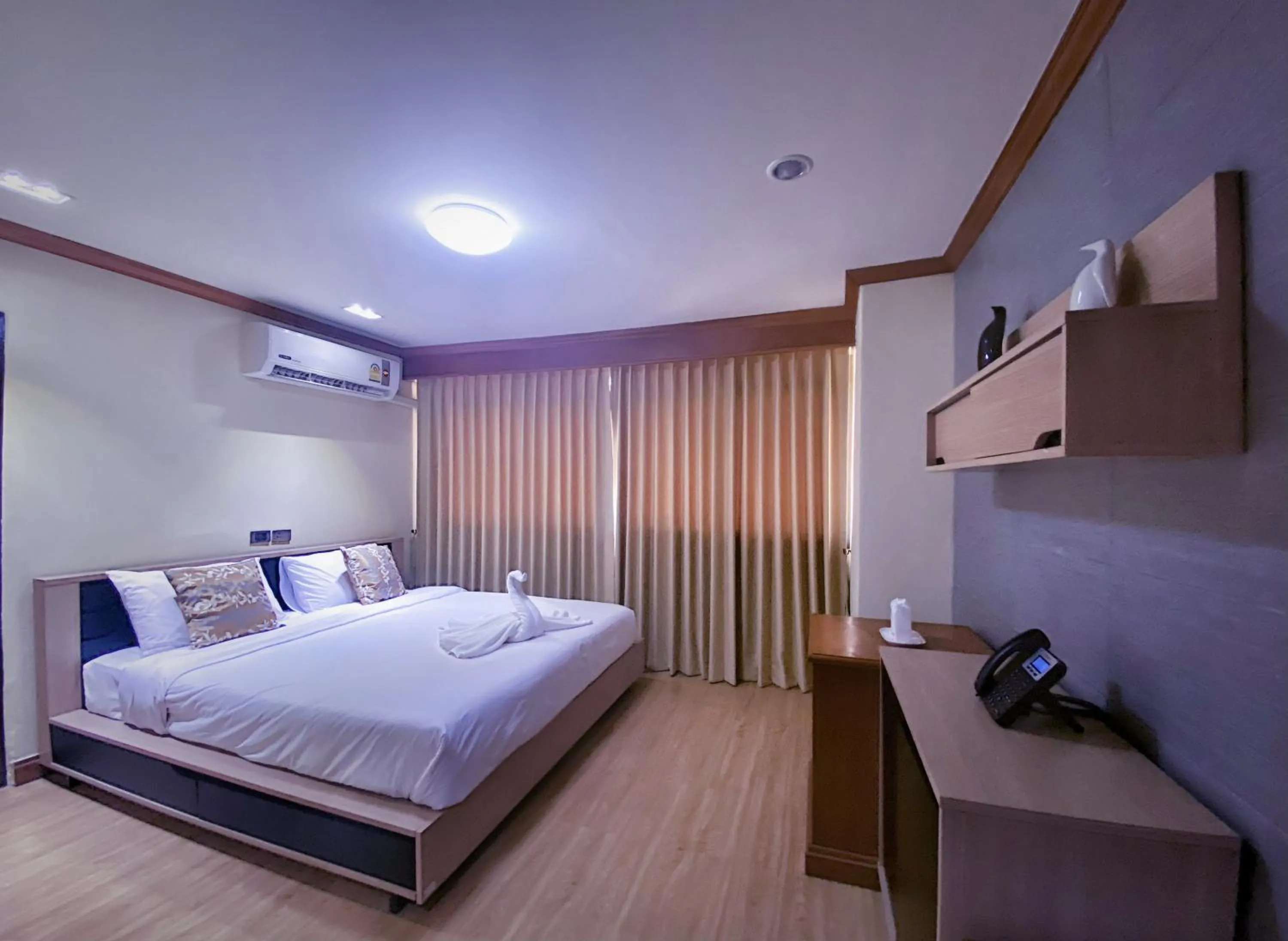 Photo of the whole room, Bed in Phuphanplace Hotel