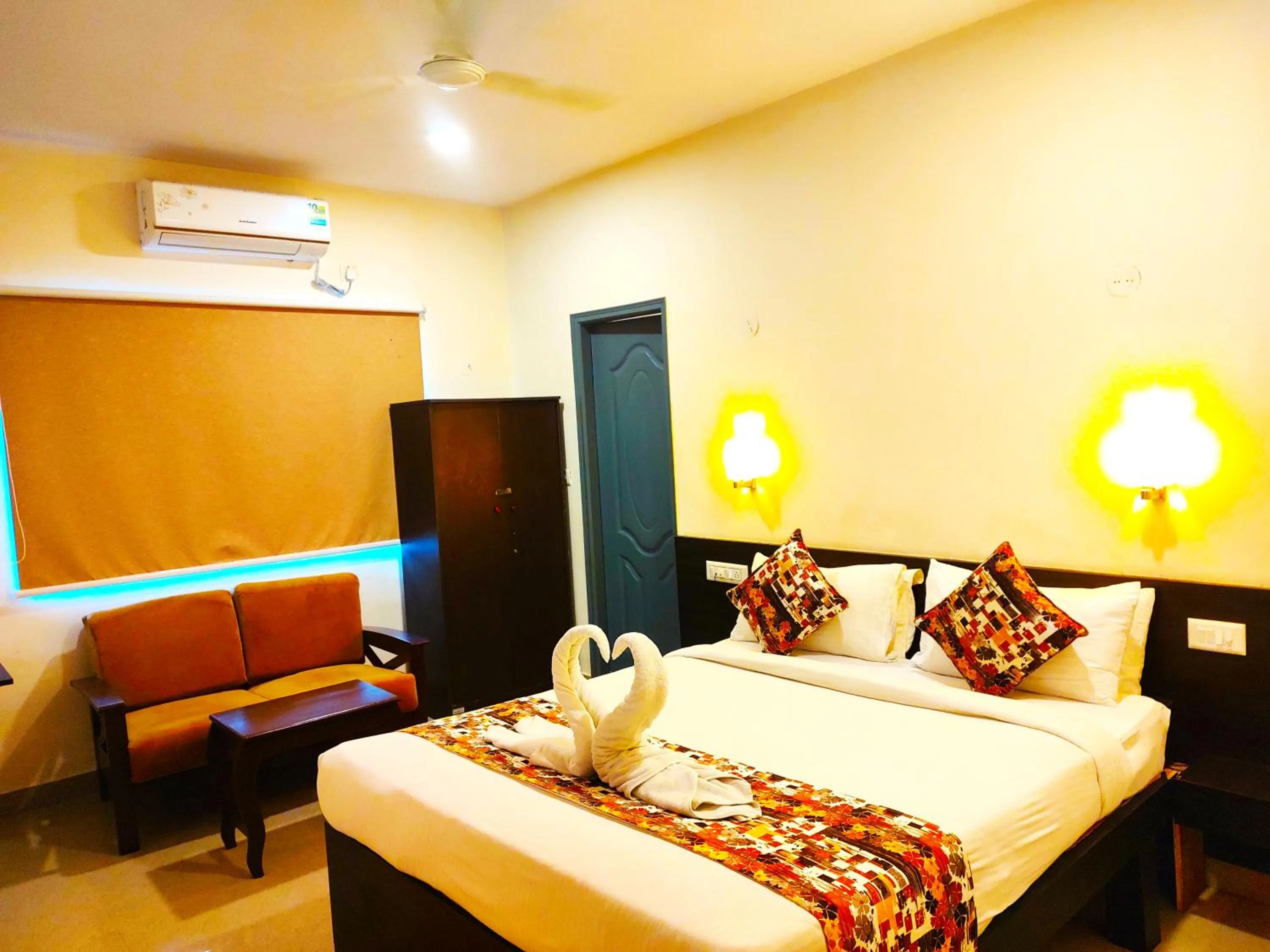 Bed in Athasri Hotel HSR Layout