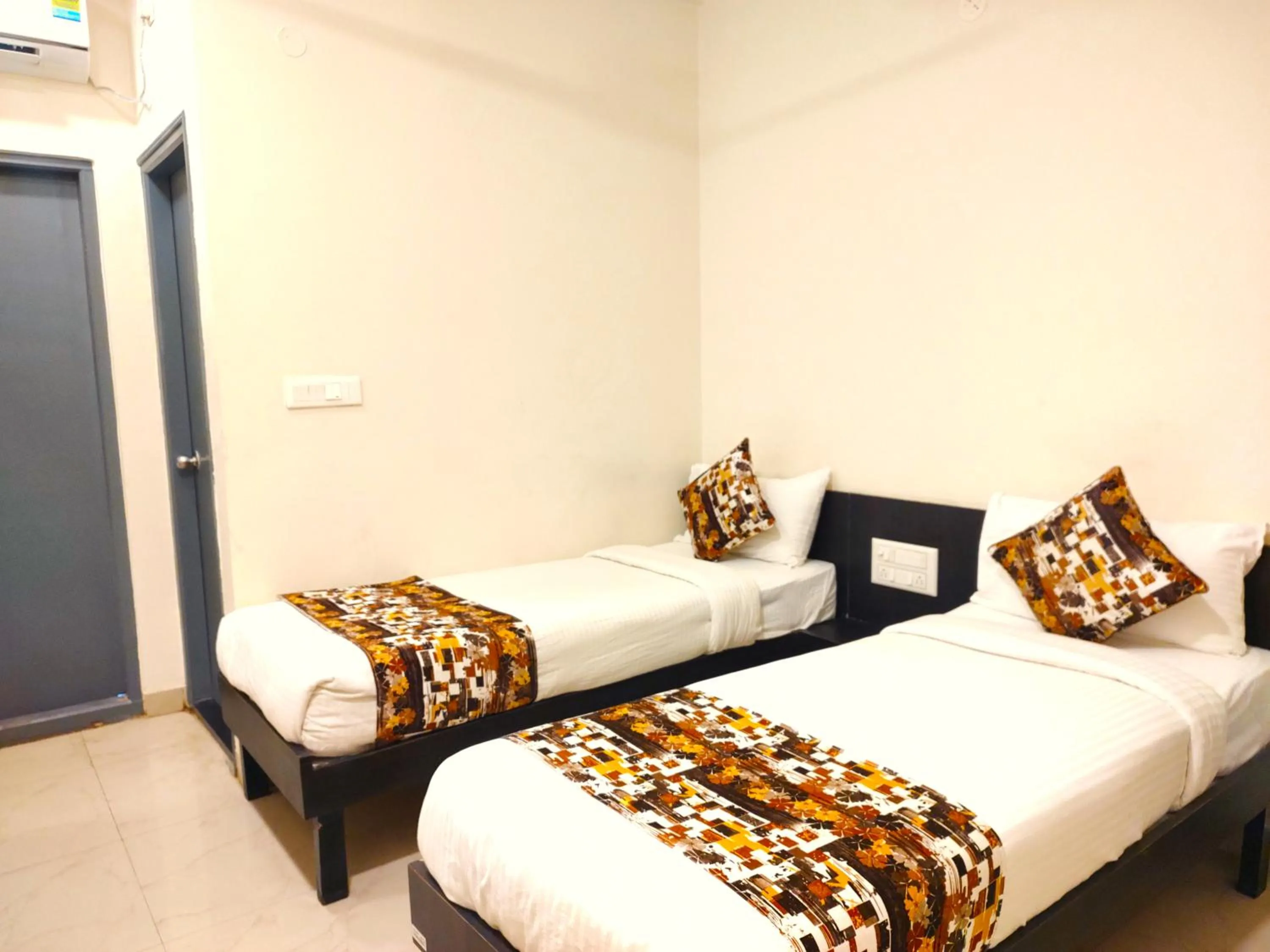 Bedroom in Athasri Hotel HSR Layout