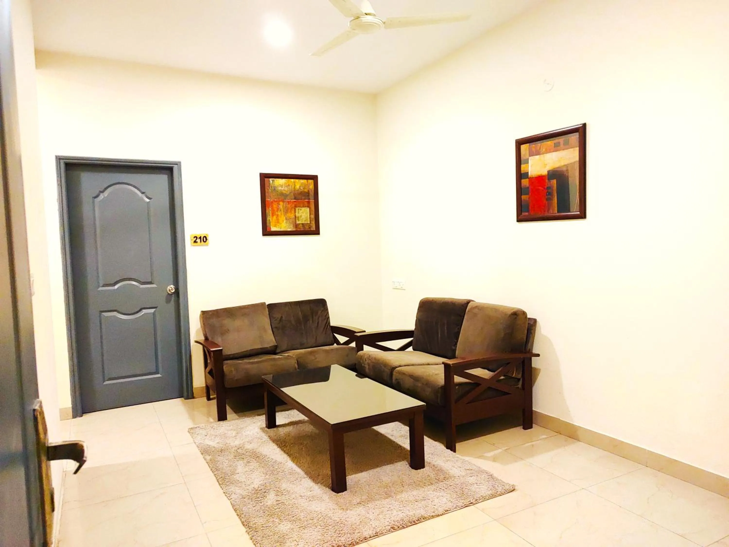 Living room in Athasri Hotel HSR Layout