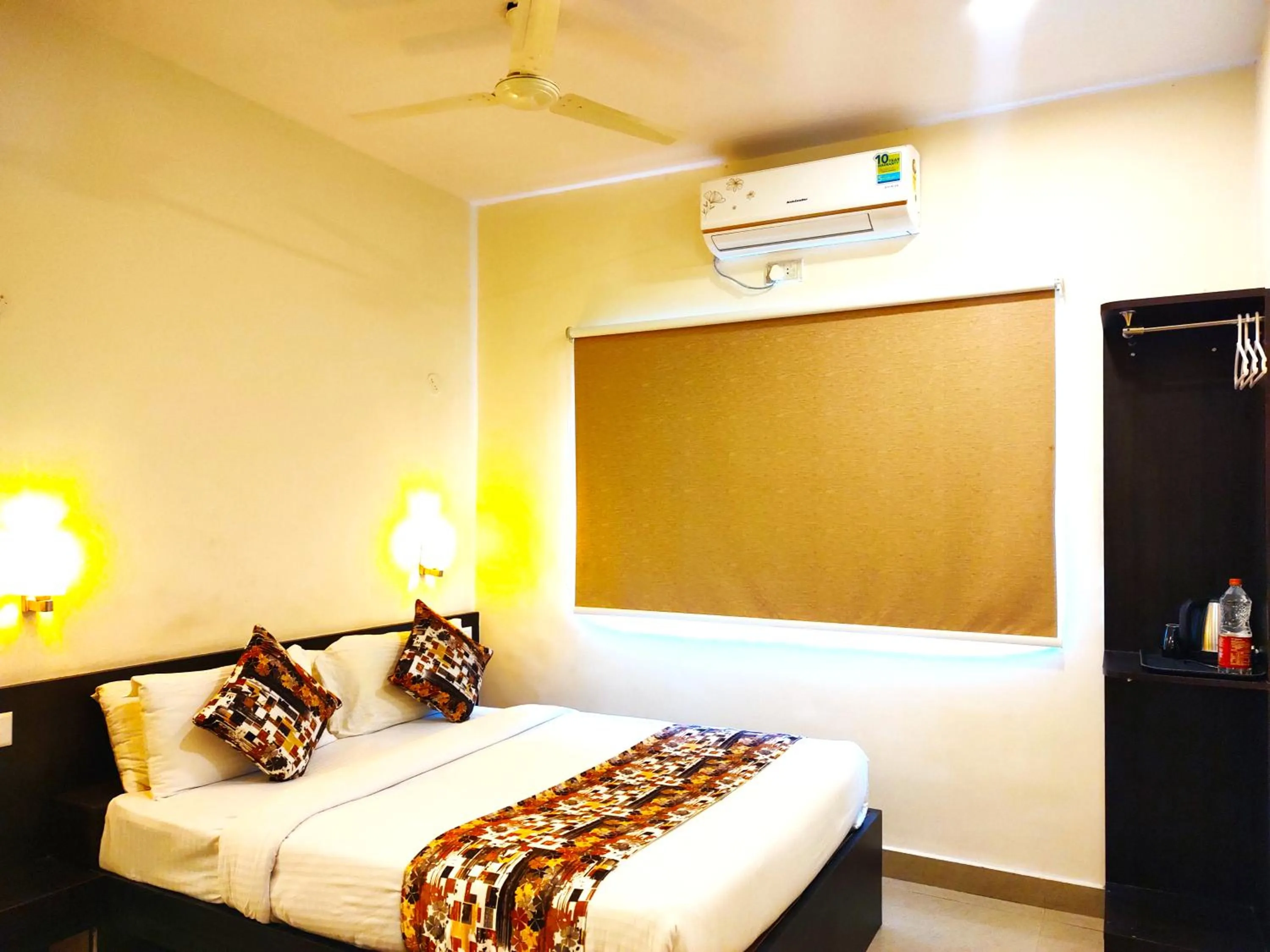 Bed in Athasri Hotel HSR Layout