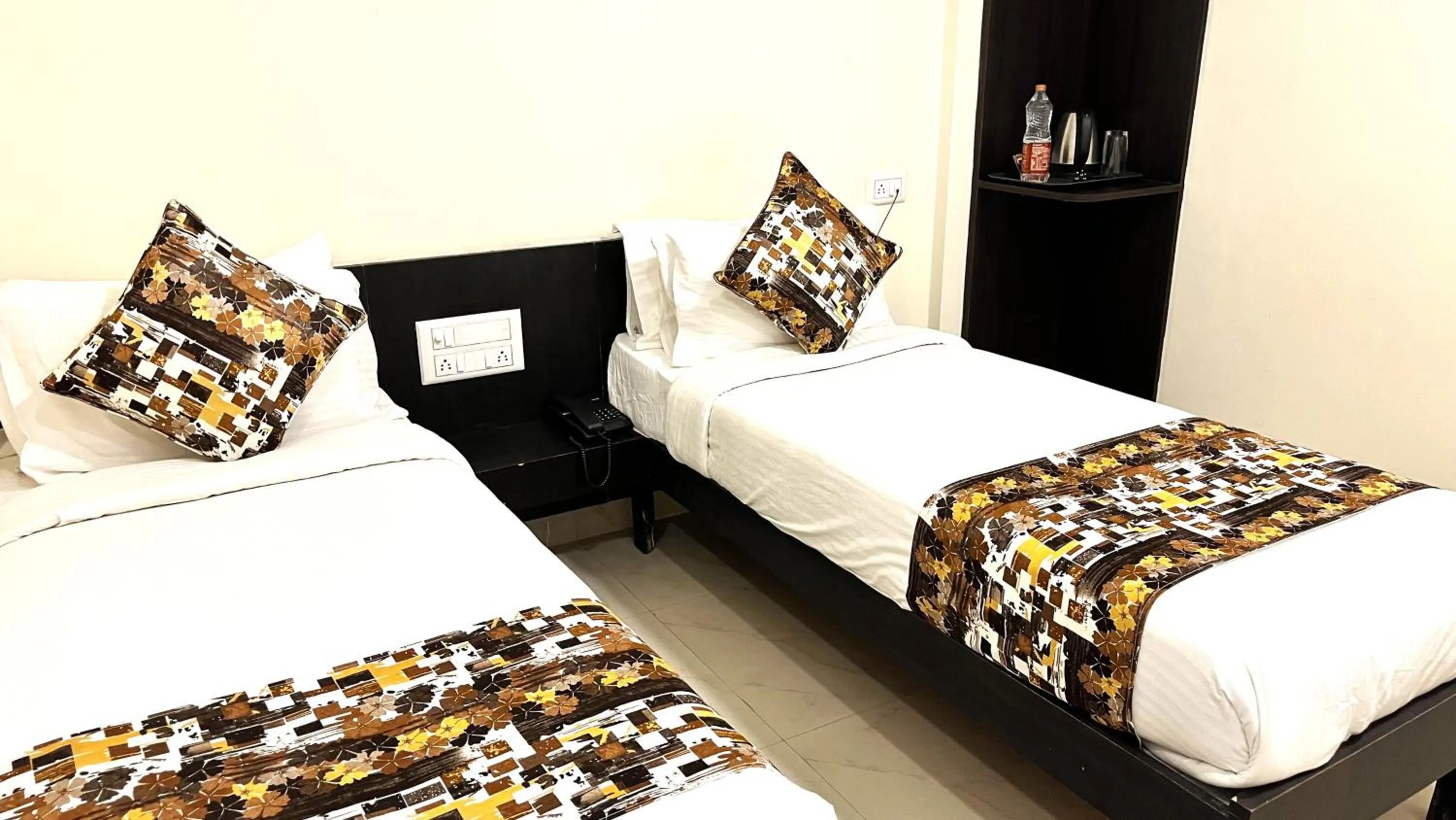 Bed in Athasri Hotel HSR Layout
