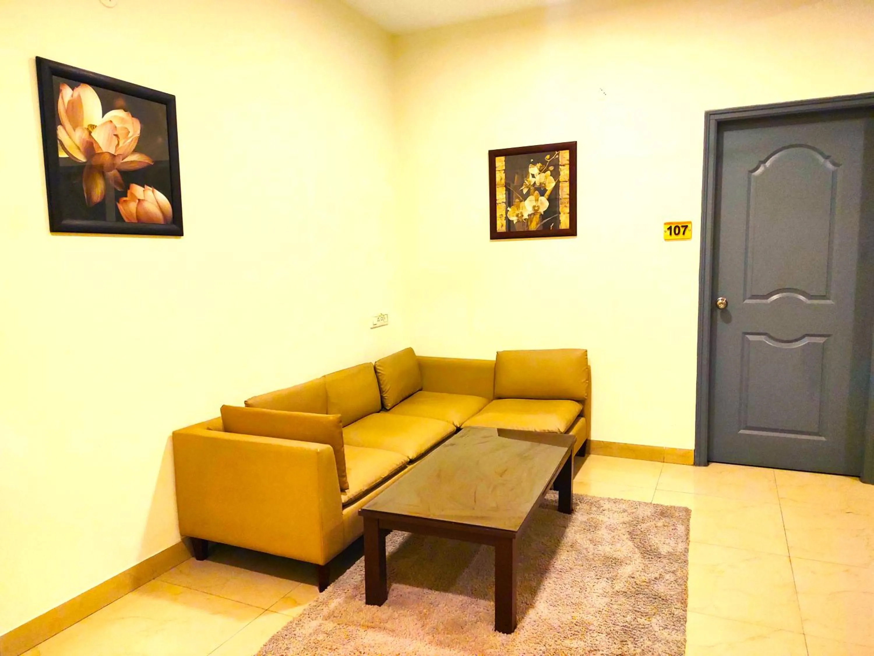 Living room in Athasri Hotel HSR Layout