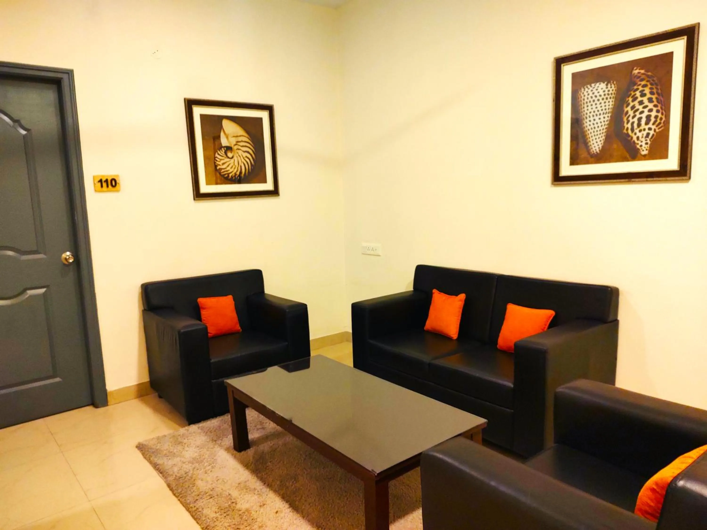 Seating area in Athasri Hotel HSR Layout