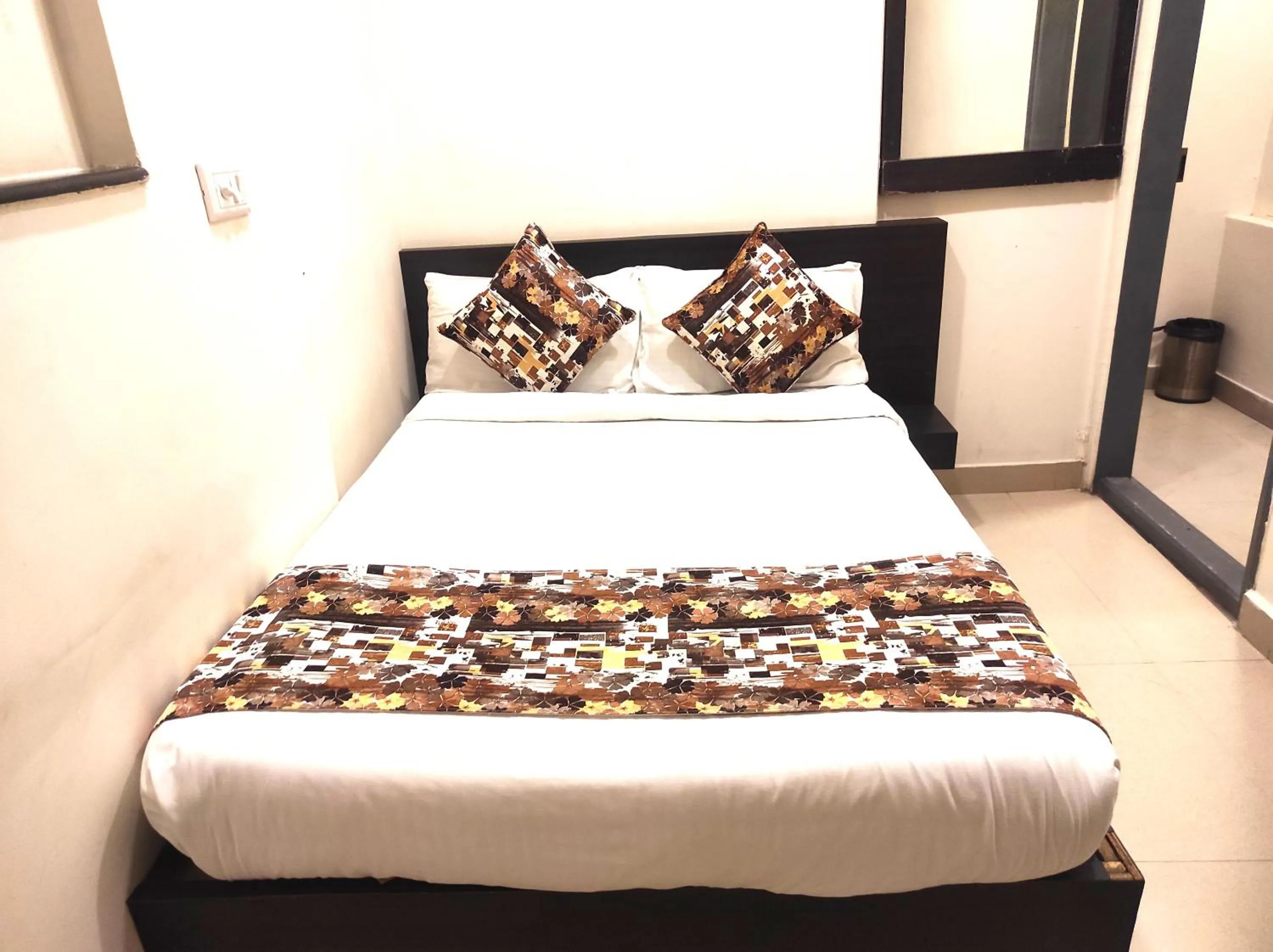 Bed in Athasri Hotel HSR Layout