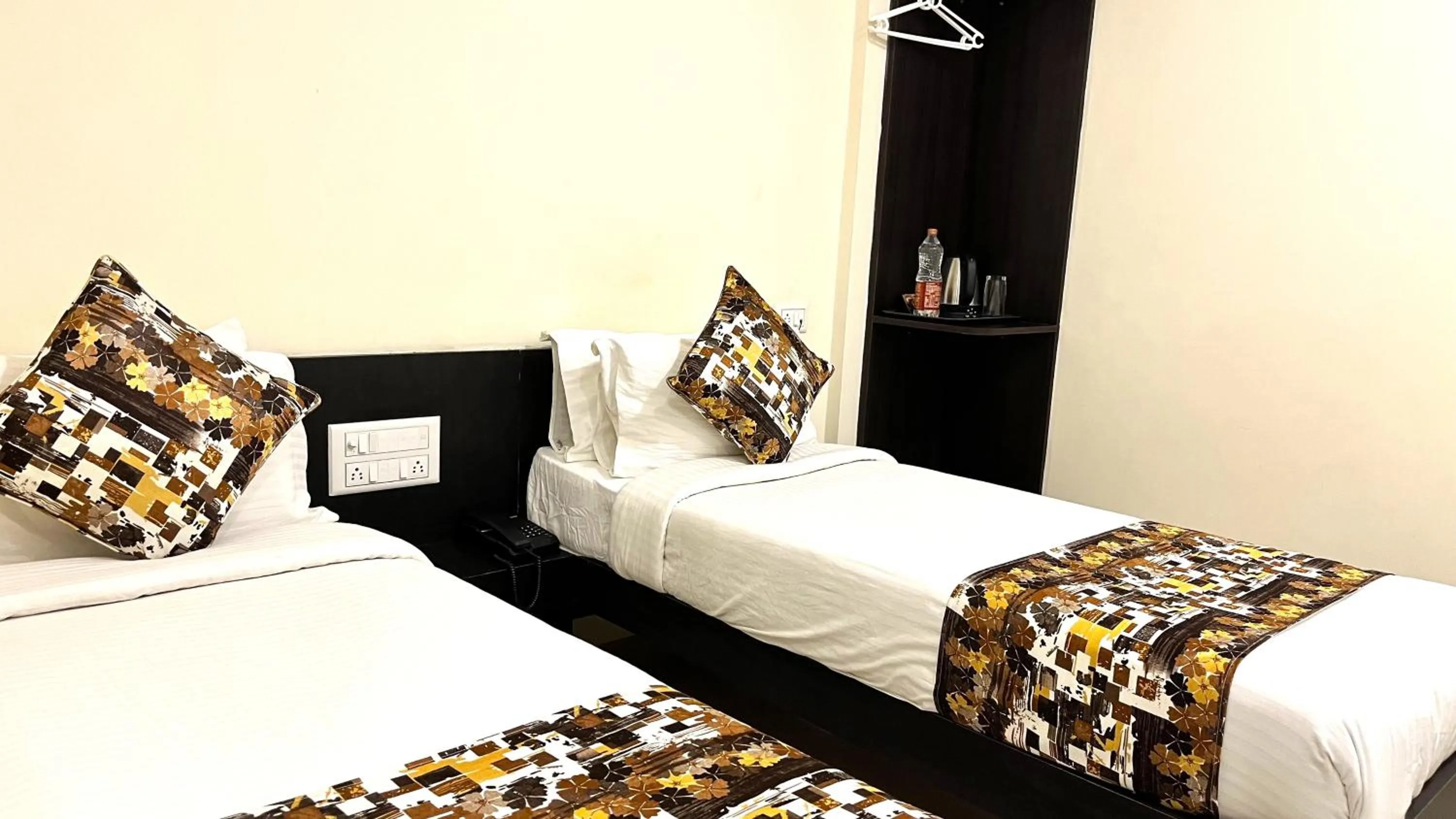Bed in Athasri Hotel HSR Layout