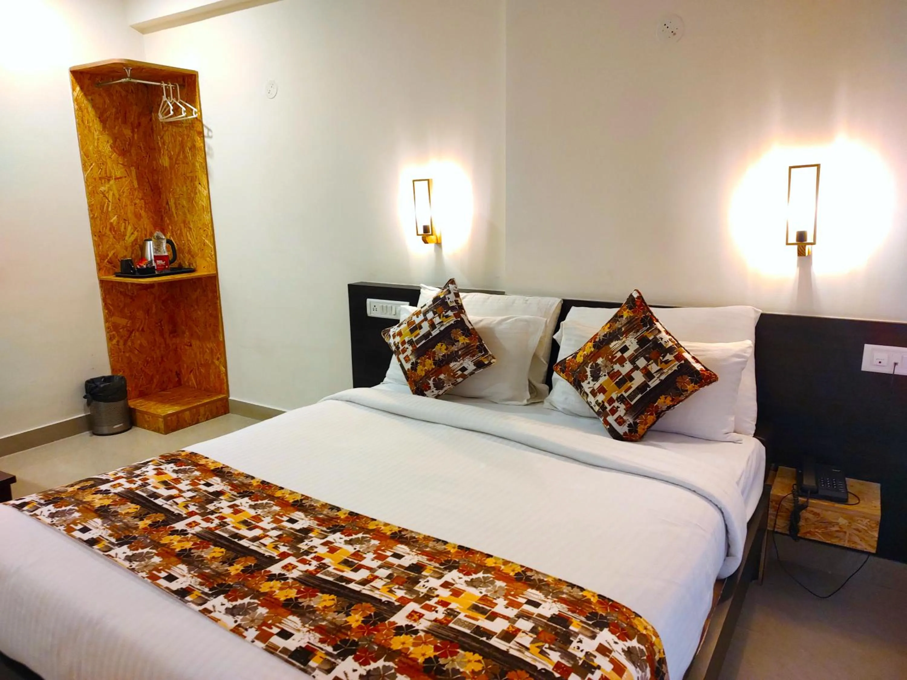 Bed in Athasri Hotel HSR Layout