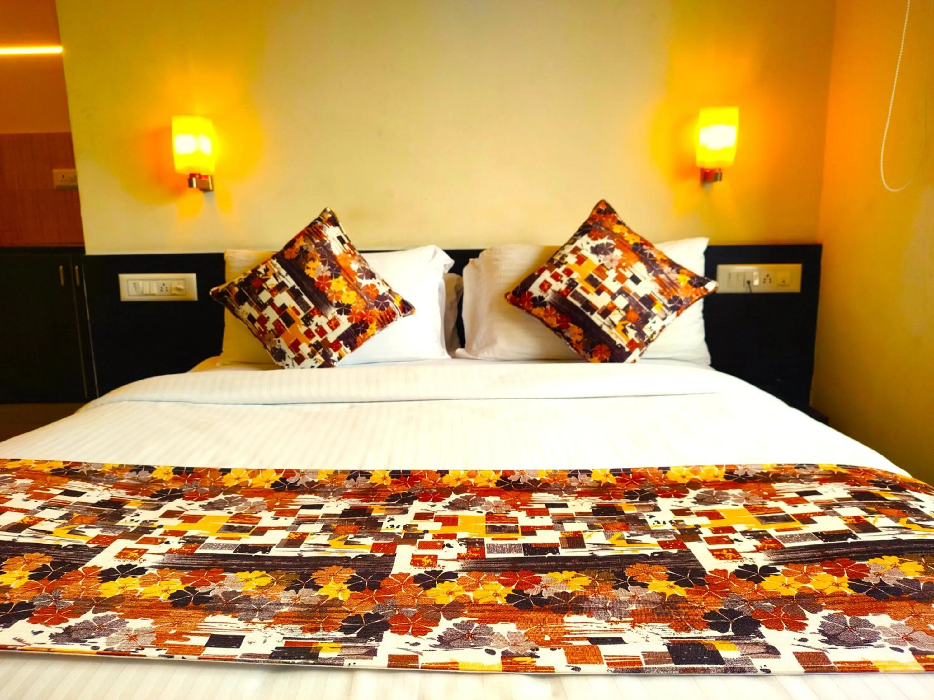 Bed in Athasri Hotel HSR Layout