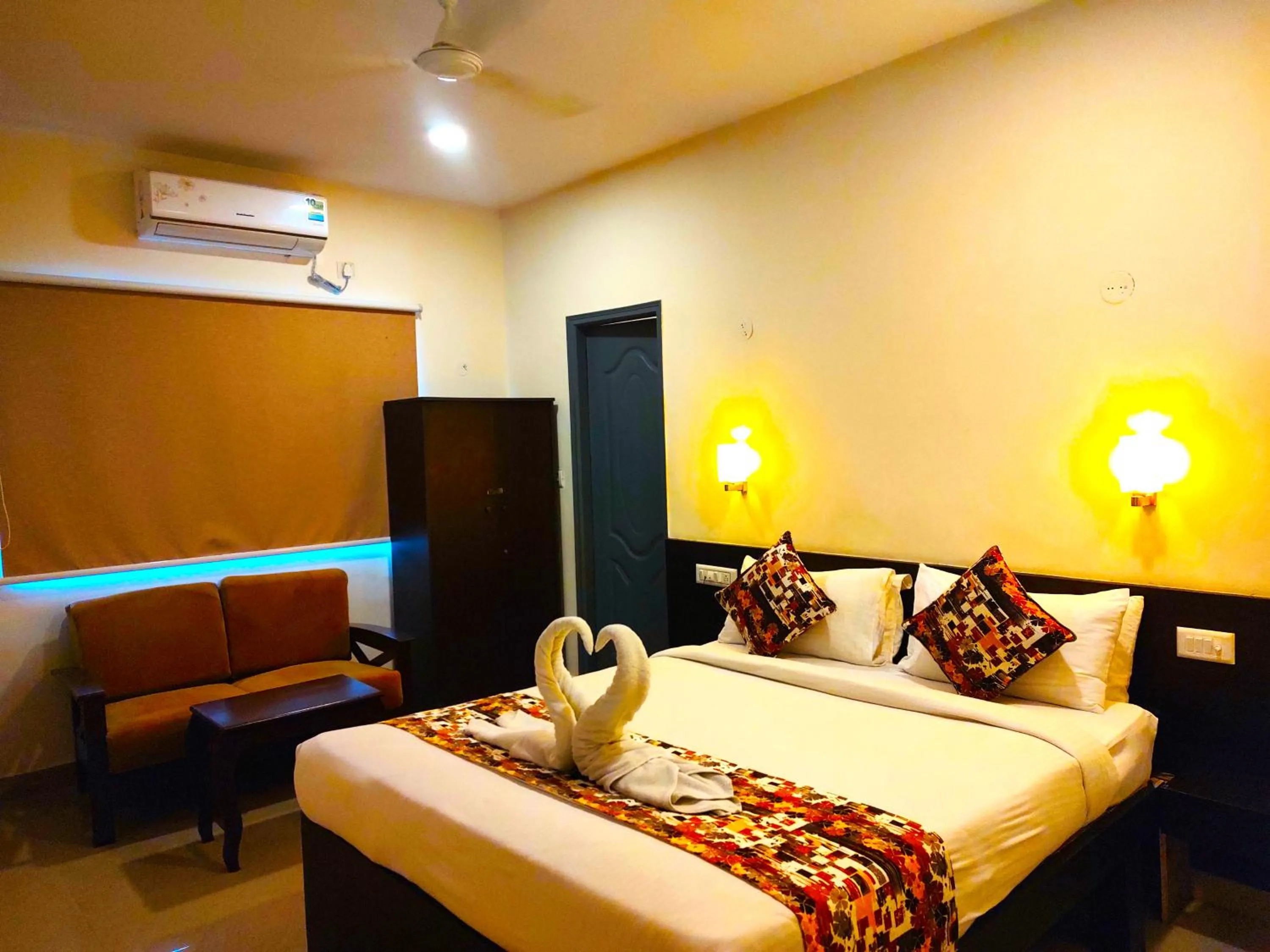 Bed in Athasri Hotel HSR Layout