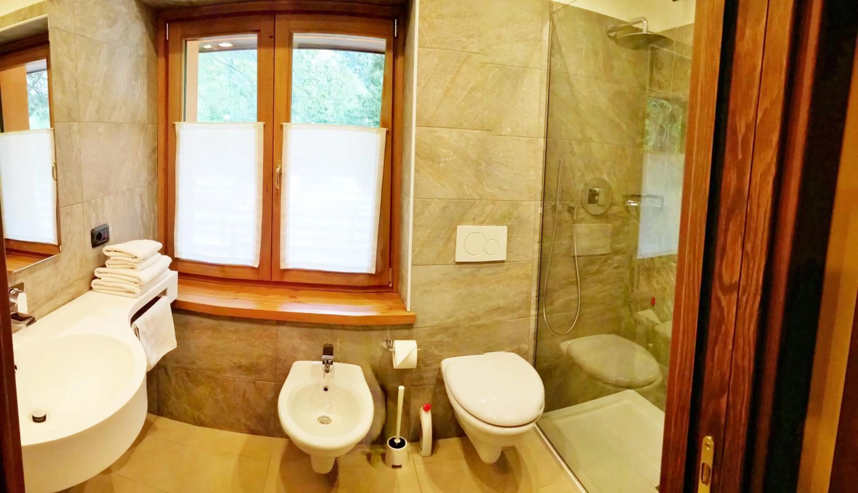 Bathroom in Chalet Alpina Hotel & Apartments